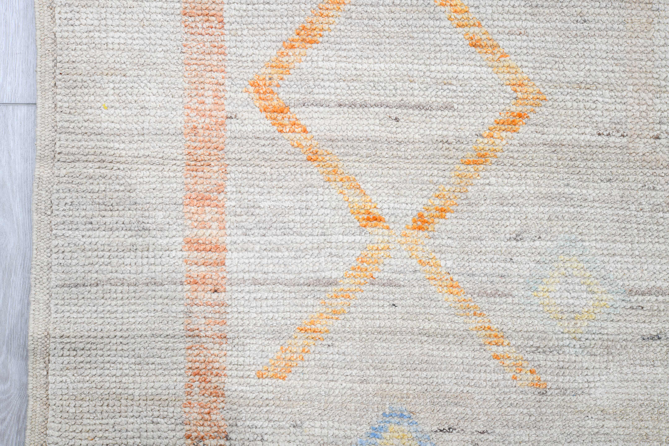 10' x 13' one-of-a-kind handmade vintage Tulu large size rug. Color palette: ivory, coral, sky_blue, pale_blue, soft_yellow