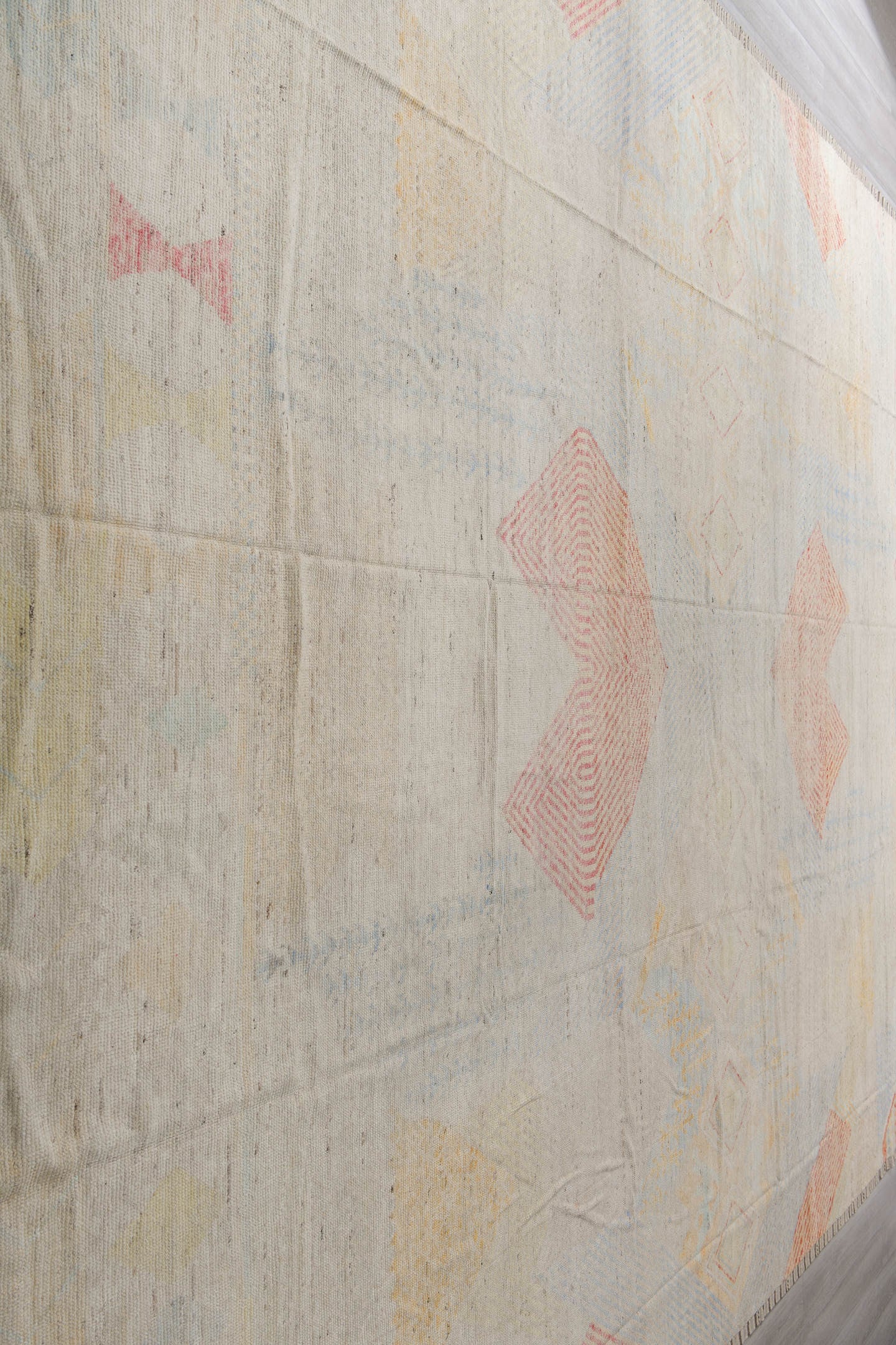 13' x 19' one-of-a-kind handmade vintage Tulu oversize rug. Color palette: ivory, pale blue, coral, soft gold, cream