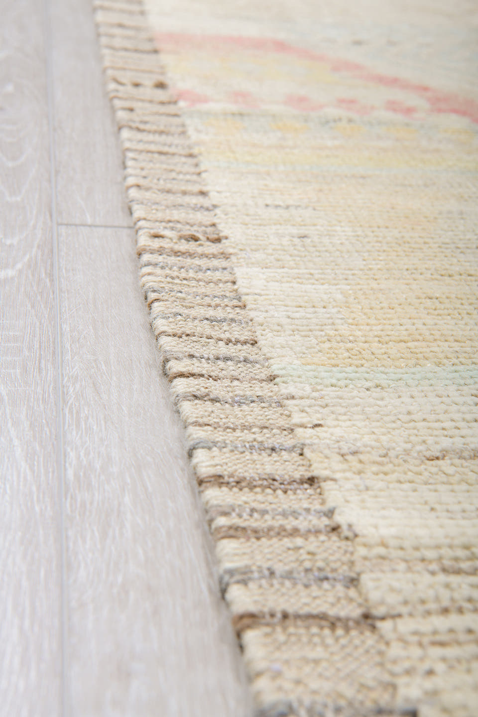 13' x 19' one-of-a-kind handmade vintage Tulu oversize rug. Color palette: ivory, pale blue, coral, soft gold, cream