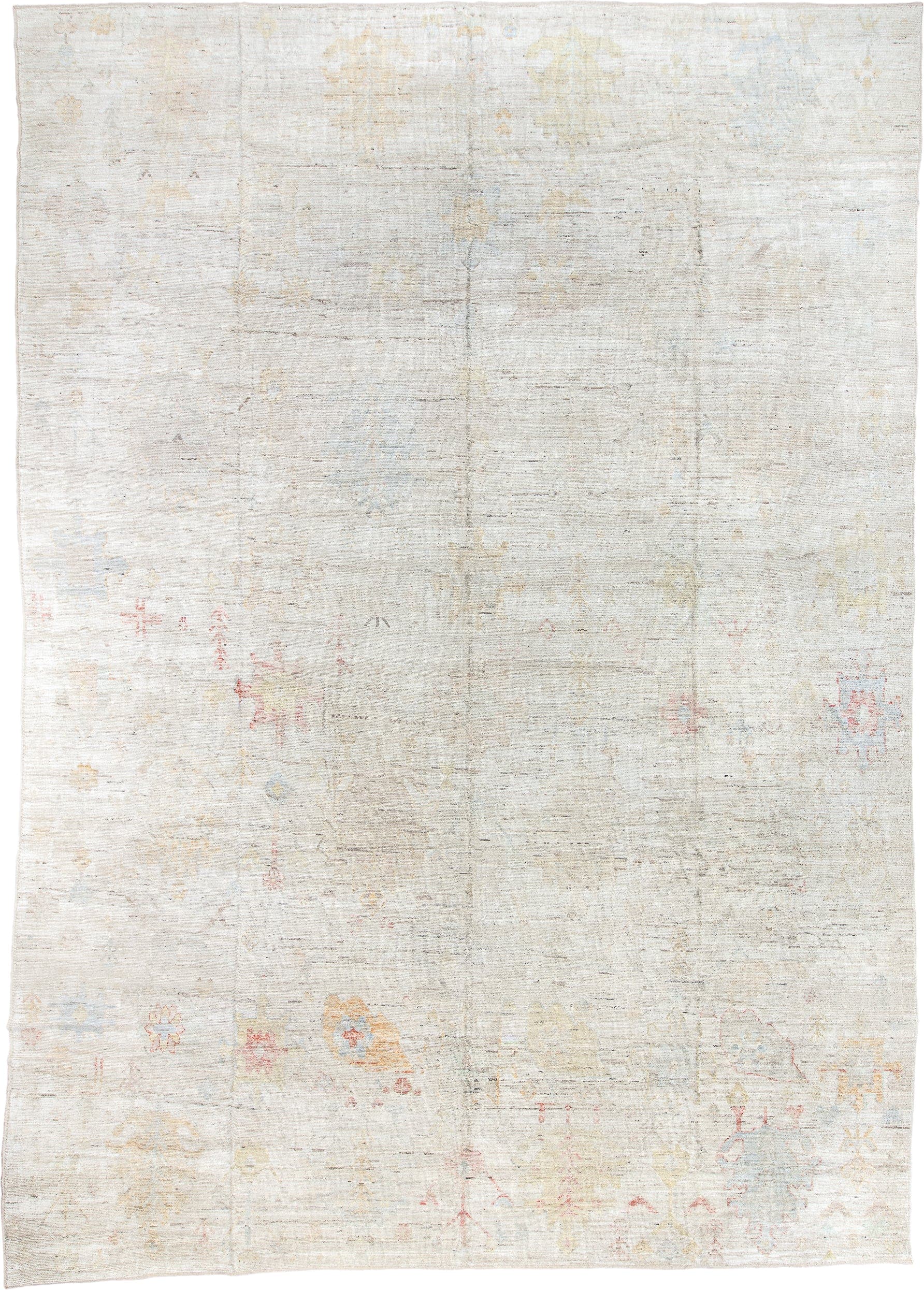 13' x 19' one-of-a-kind handmade vintage Tulu oversize rug. Color palette: ivory, cream, pale blue, blush, sand, gold, taupe