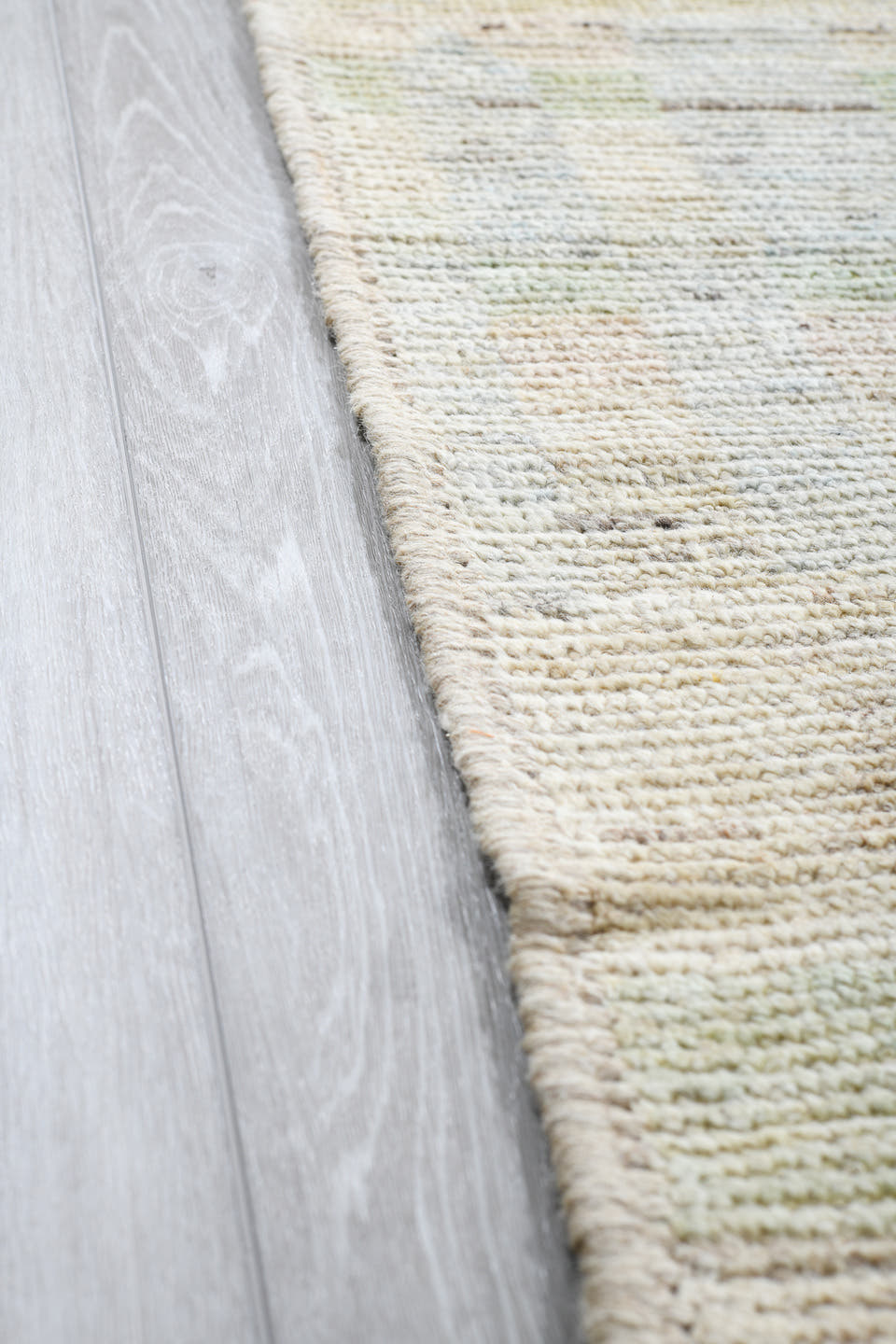13' x 19' one-of-a-kind handmade vintage Tulu oversize rug. Color palette: ivory, pale blue, cream, celadon, taupe