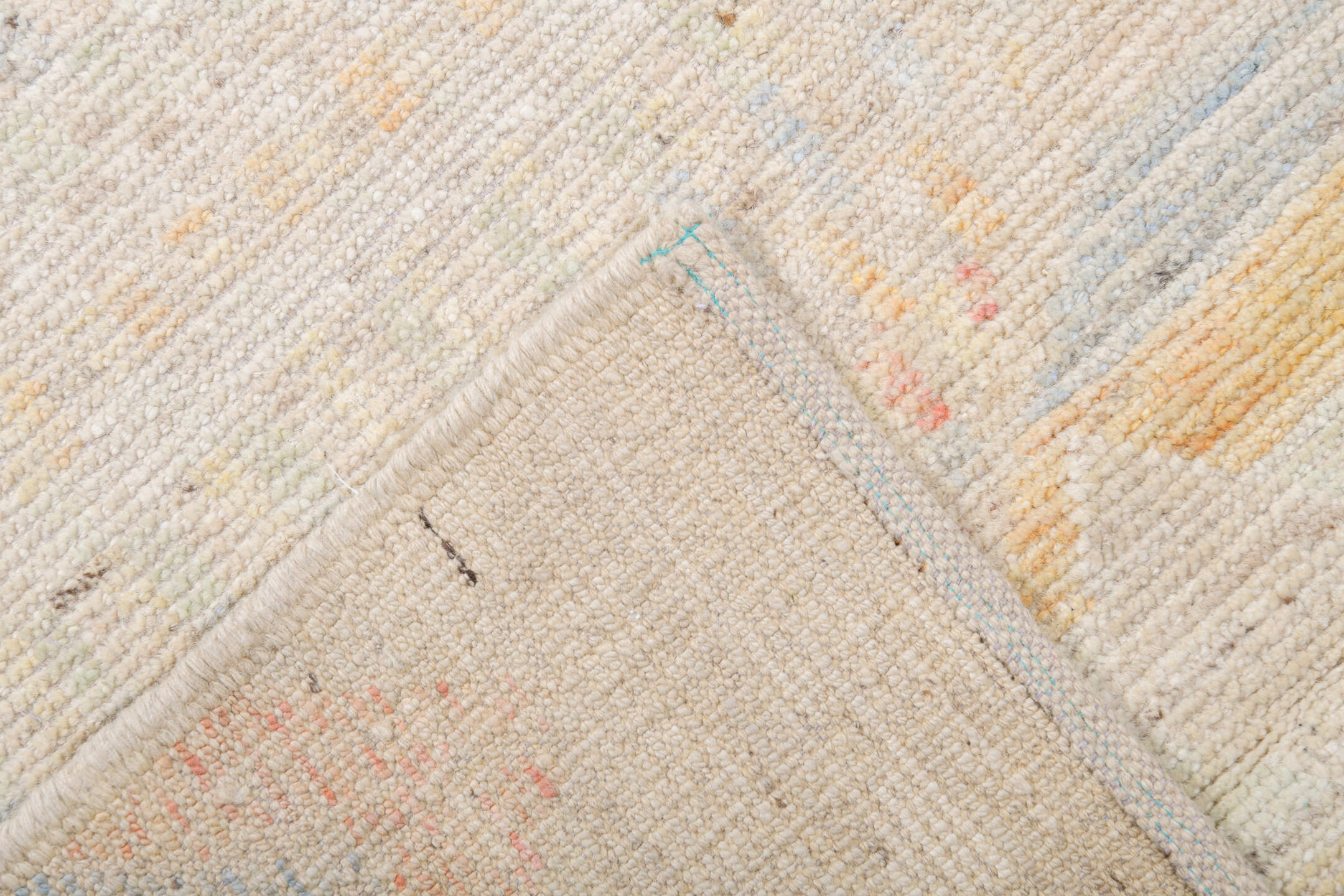 13' x 19' one-of-a-kind handmade vintage Tulu oversize rug. Color palette: ivory, cream, pale blue, blush, soft yellow