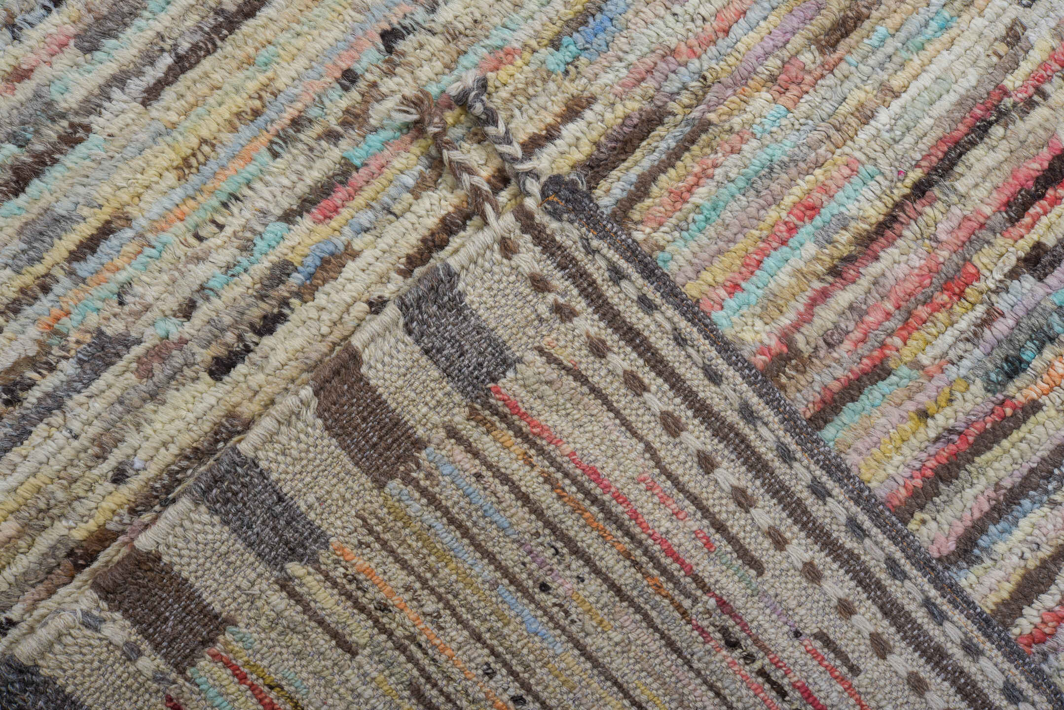 10' x 13' one-of-a-kind handmade vintage Tulu large size rug. Color palette: ivory, taupe, charcoal, cream, pale blue, coral