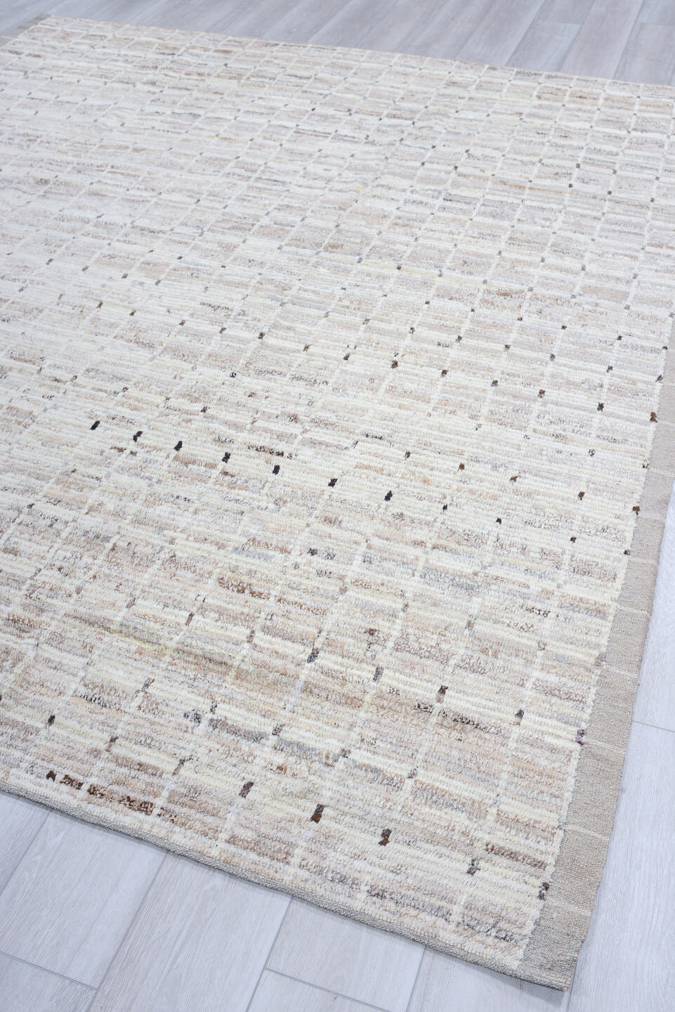 8' x 9' one-of-a-kind handmade vintage Tulu rug. Color palette: ivory, taupe, beige, gray, charcoal, black