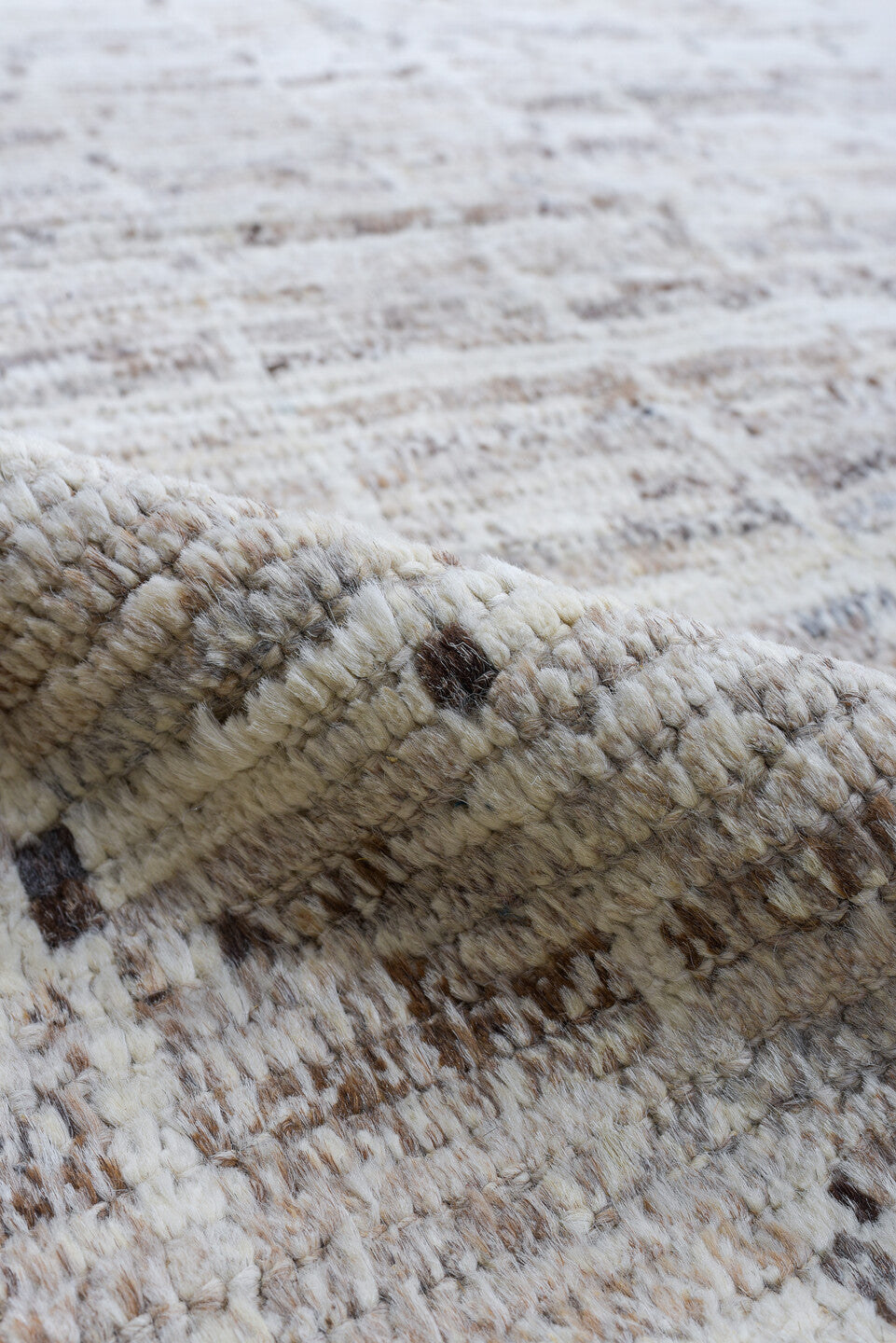 8' x 9' one-of-a-kind handmade vintage Tulu rug. Color palette: ivory, taupe, beige, gray, charcoal, black