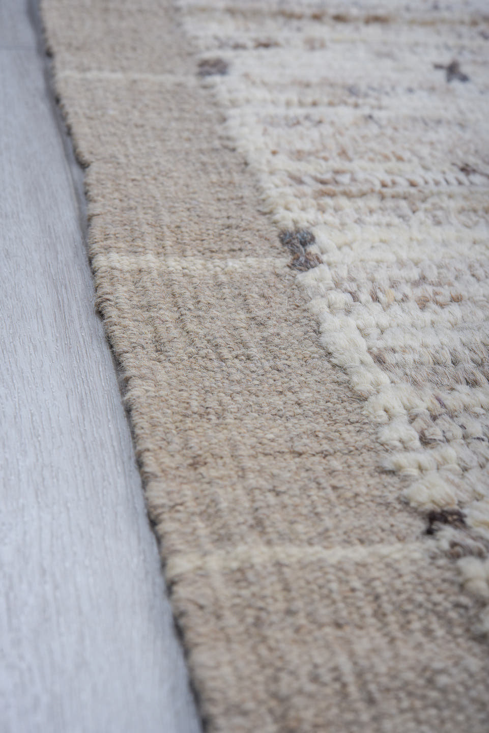 8' x 9' one-of-a-kind handmade vintage Tulu rug. Color palette: ivory, taupe, beige, gray, charcoal, black