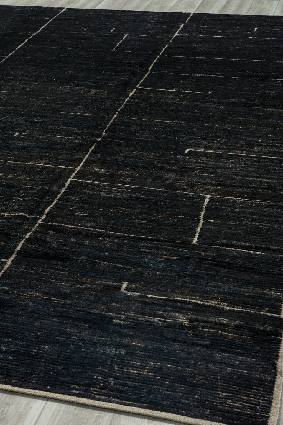 9' x 12' one-of-a-kind handmade vintage Tulu large size rug. Color palette: charcoal, ivory, ebony, taupe, gray, black