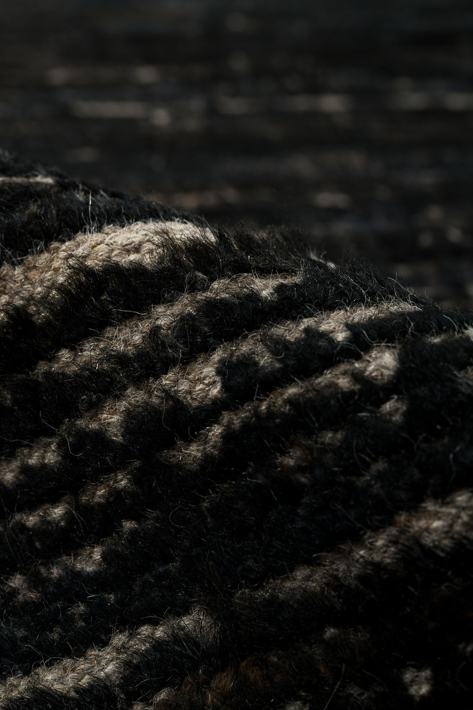 9' x 12' one-of-a-kind handmade vintage Tulu large size rug. Color palette: charcoal, ivory, ebony, taupe, gray, black