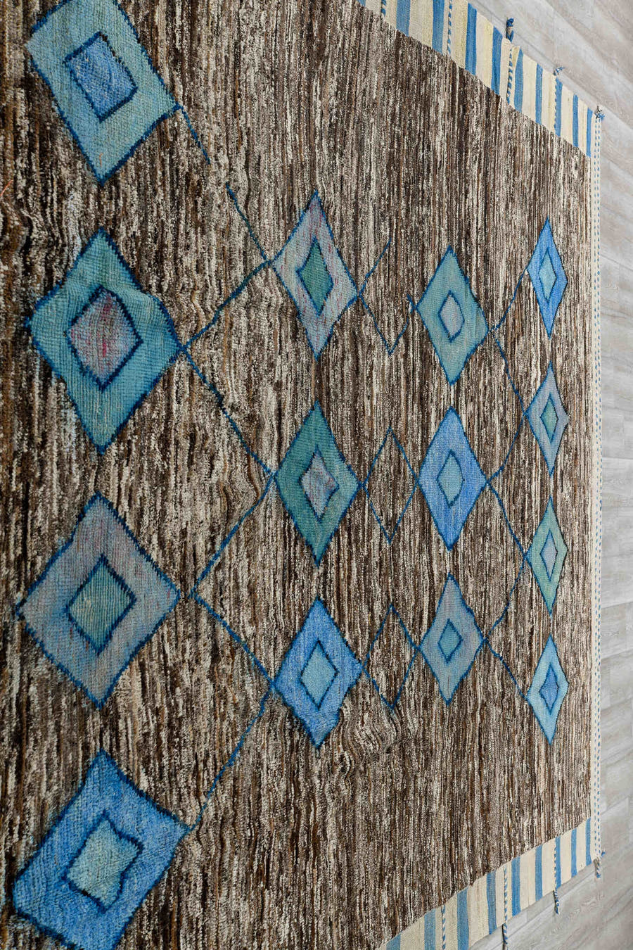 8' x 13' one-of-a-kind handmade vintage Tulu large size rug. Color palette: brown, ivory, sky blue, powder blue, camel