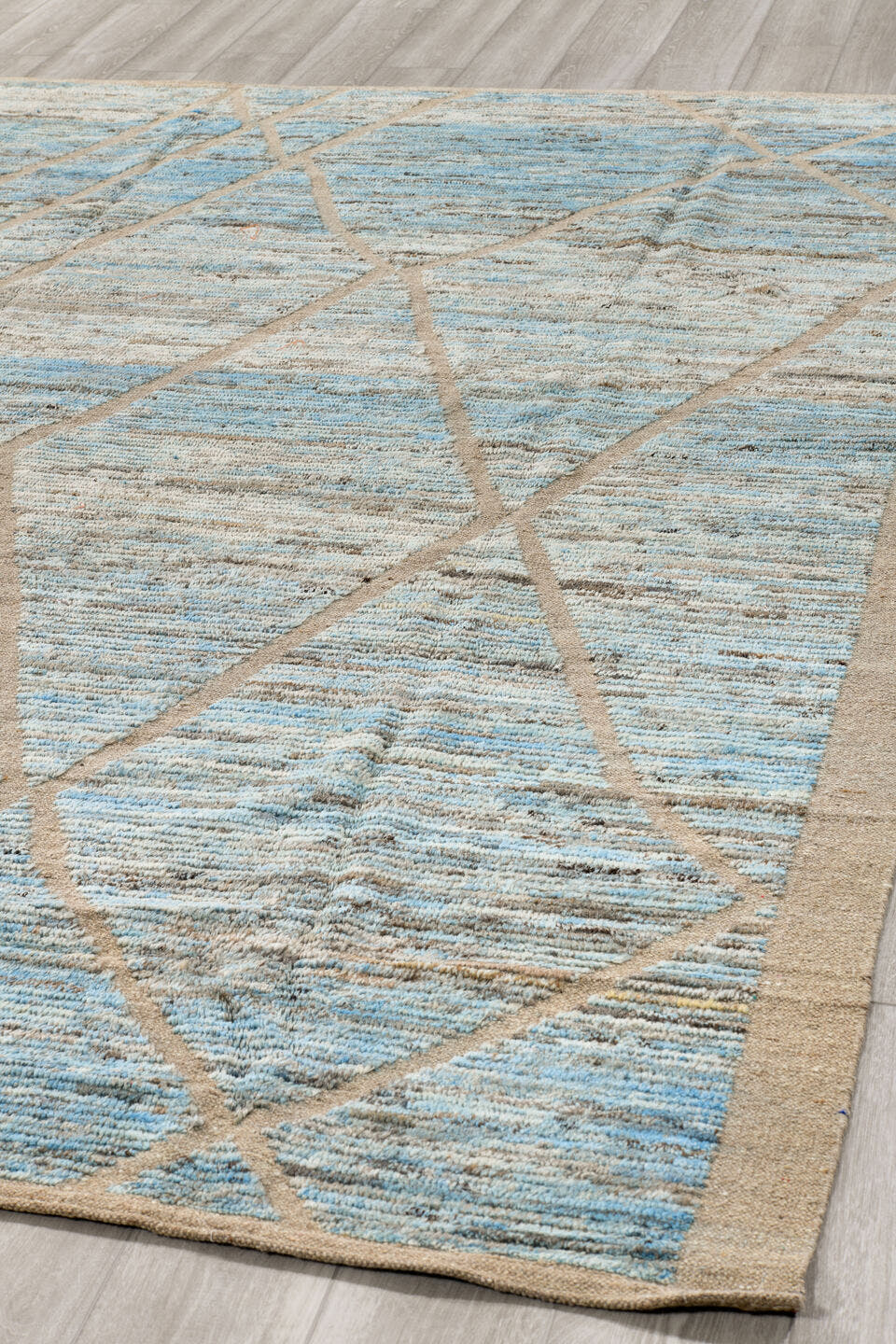 8' x 9' one-of-a-kind handmade vintage Tulu rug. Color palette: ivory, pale blue, taupe, beige, camel, brown, light blue