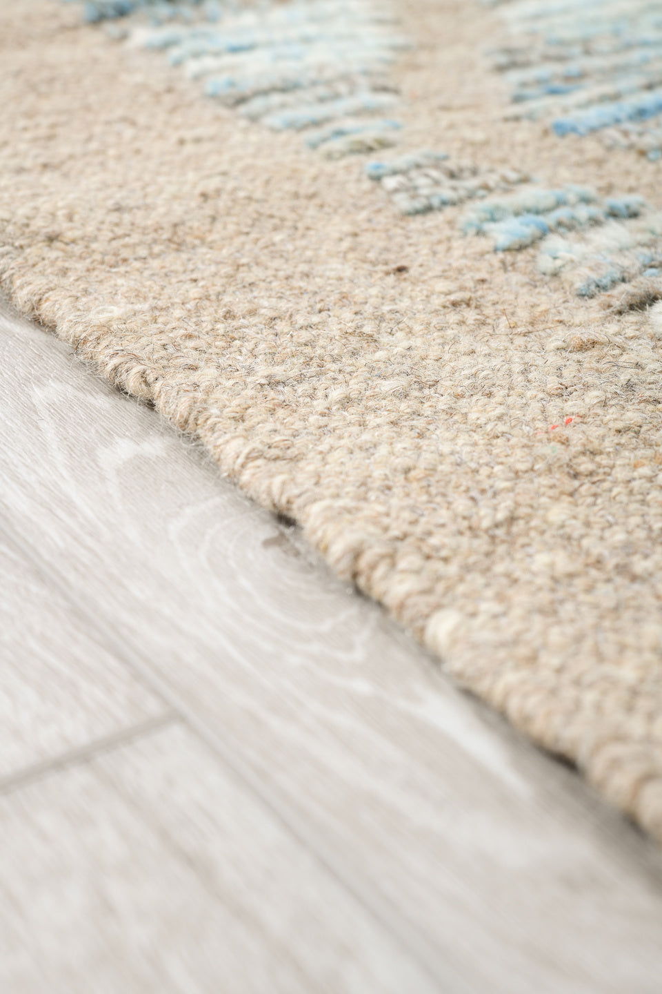8' x 9' one-of-a-kind handmade vintage Tulu rug. Color palette: ivory, pale blue, taupe, beige, camel, brown, light blue