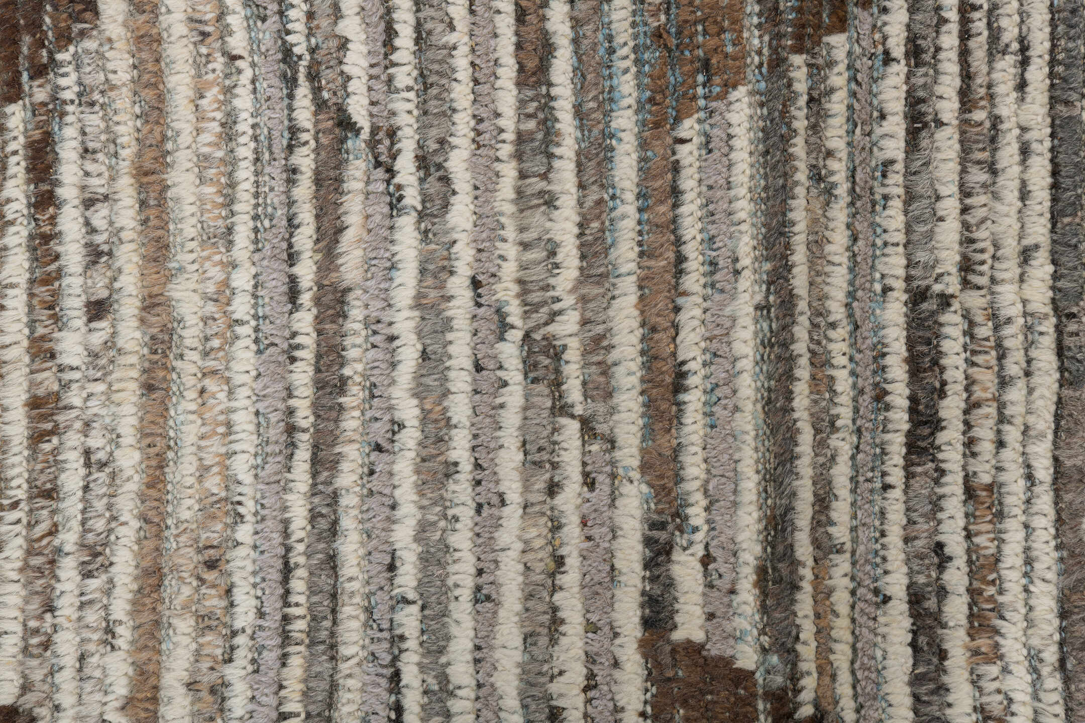 8' x 9' one-of-a-kind handmade vintage Tulu rug. Color palette: ivory, brown, taupe, charcoal, camel, beige, gray, black