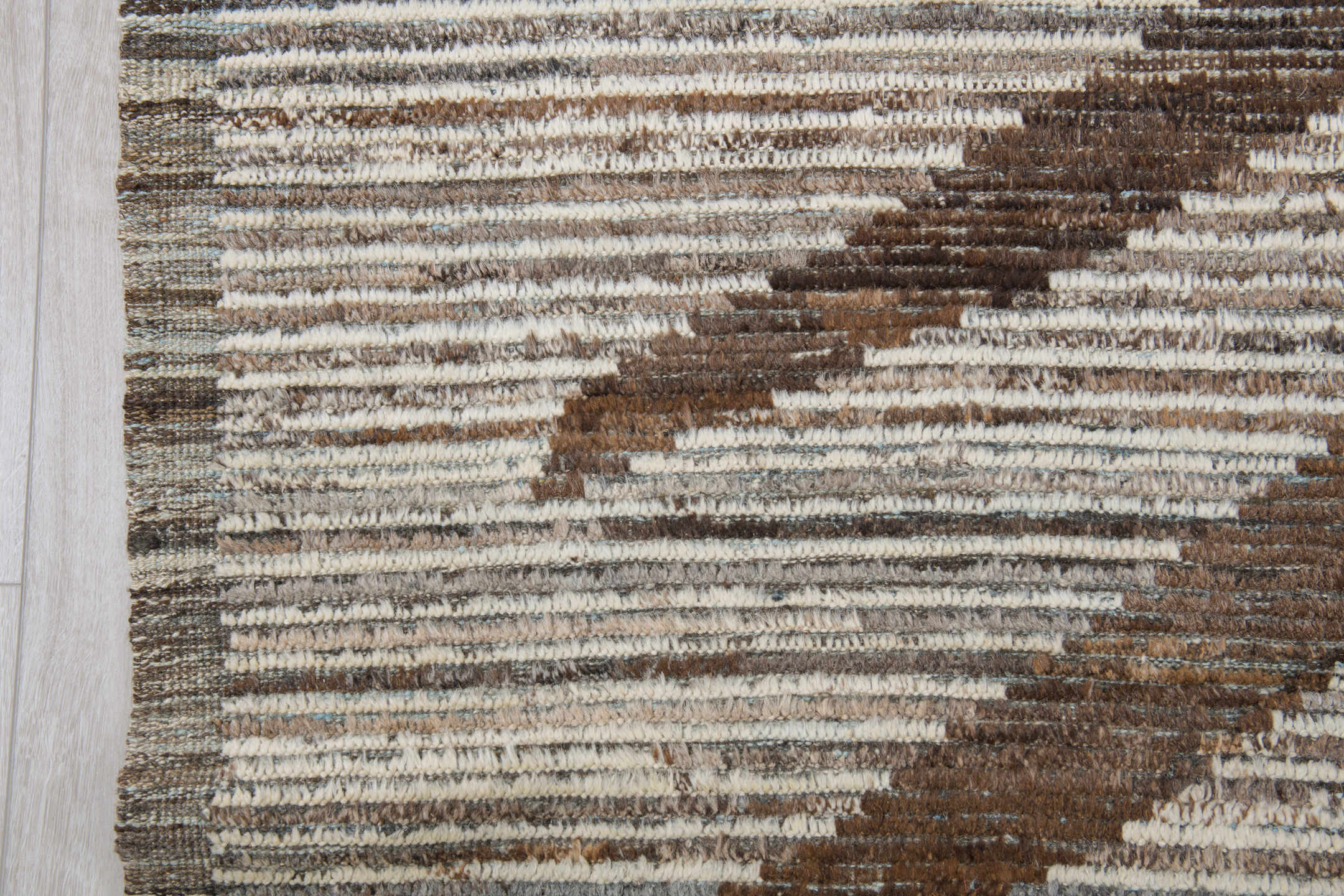 8' x 9' one-of-a-kind handmade vintage Tulu rug. Color palette: ivory, brown, taupe, charcoal, camel, beige, gray, black