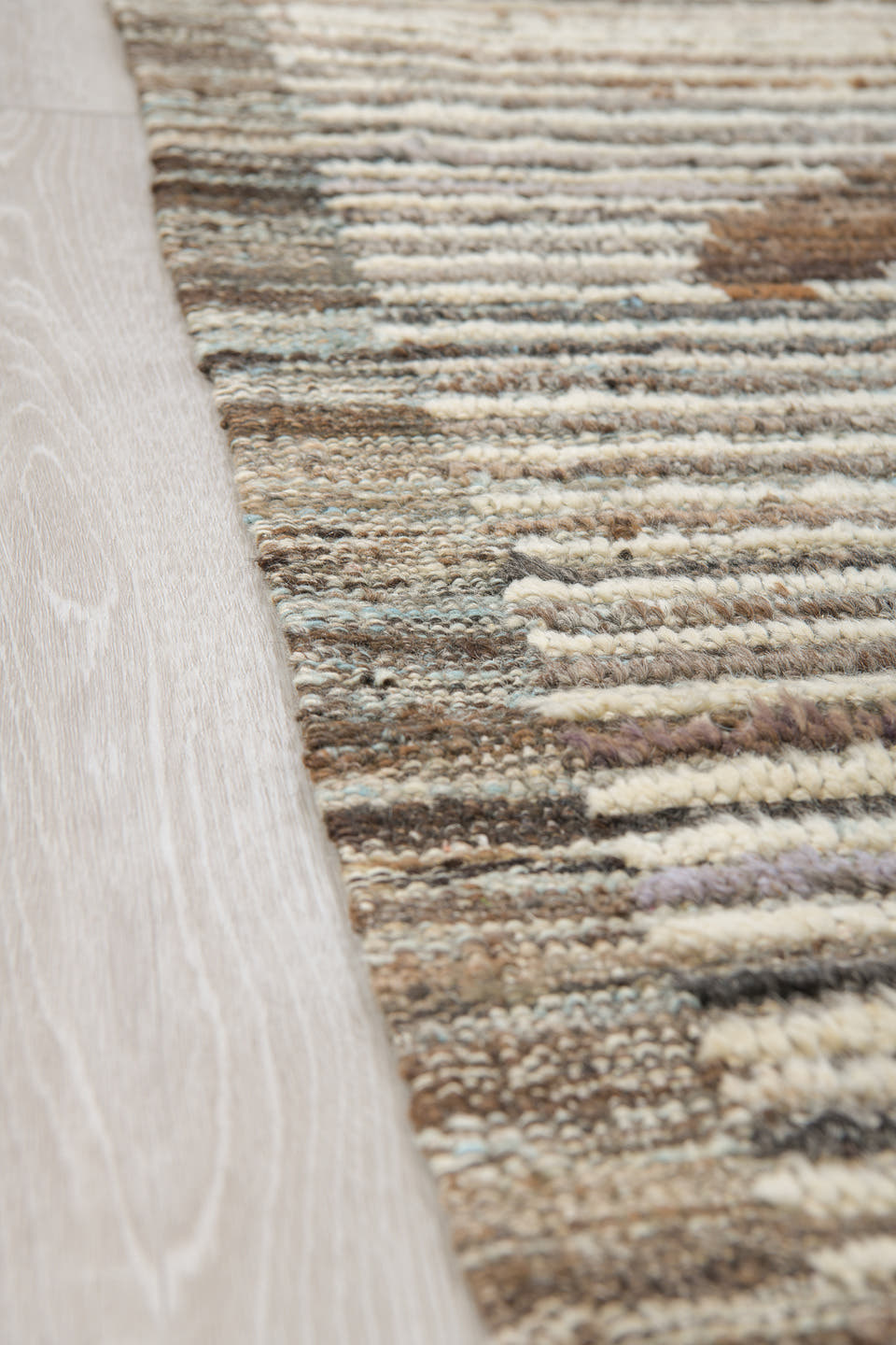 8' x 9' one-of-a-kind handmade vintage Tulu rug. Color palette: ivory, brown, taupe, charcoal, camel, beige, gray, black