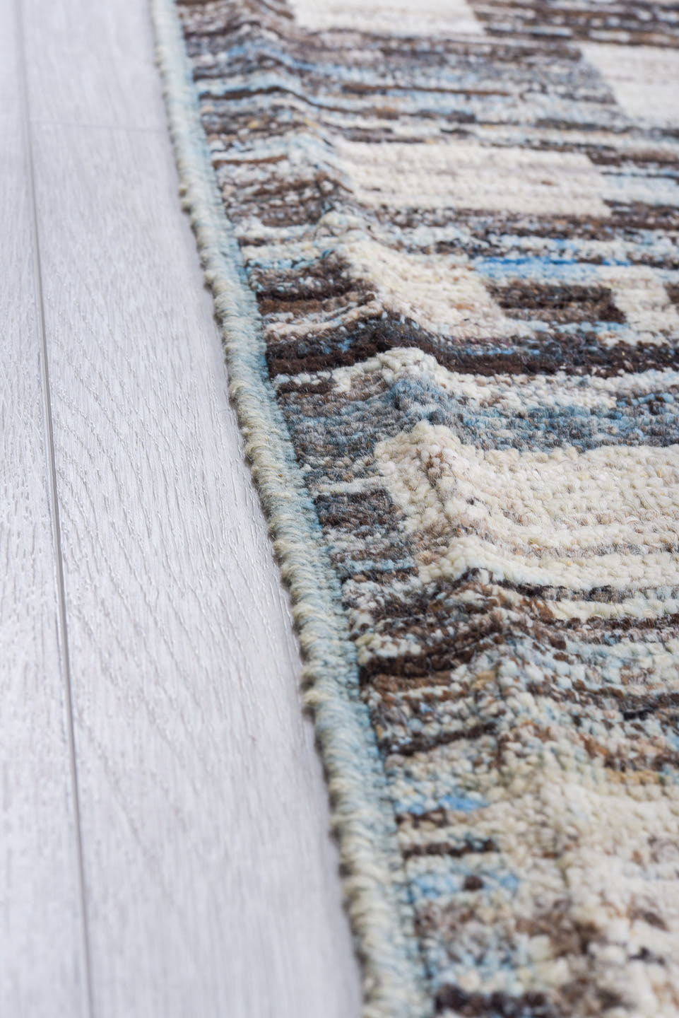 10' x 14' one-of-a-kind handmade vintage Tulu large size rug. Color palette: charcoal, ivory, slate, sky blue, taupe, gray