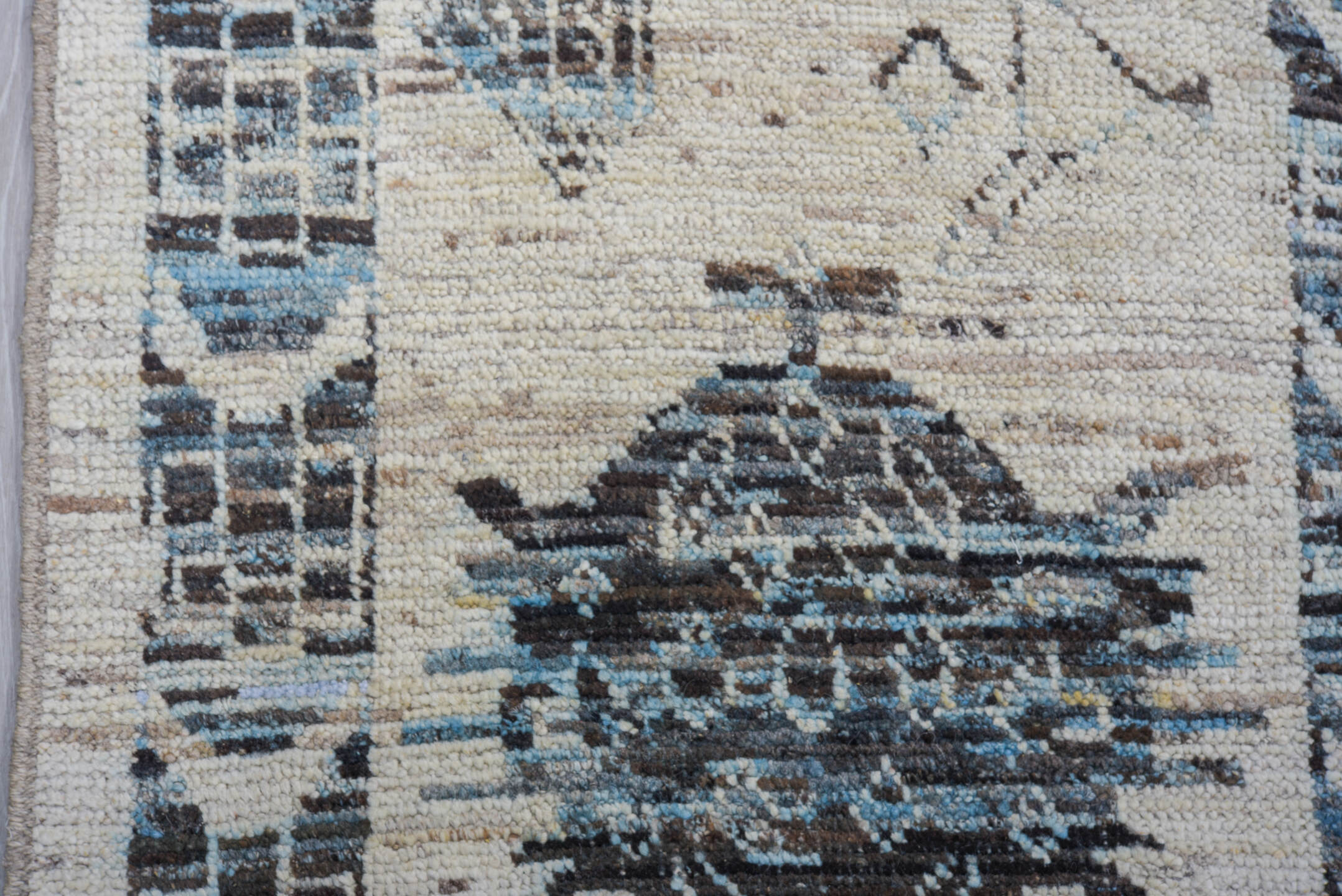 9' x 13' one-of-a-kind handmade vintage Tulu large size rug. Color palette: ivory, charcoal, pale blue, slate, cream, gray