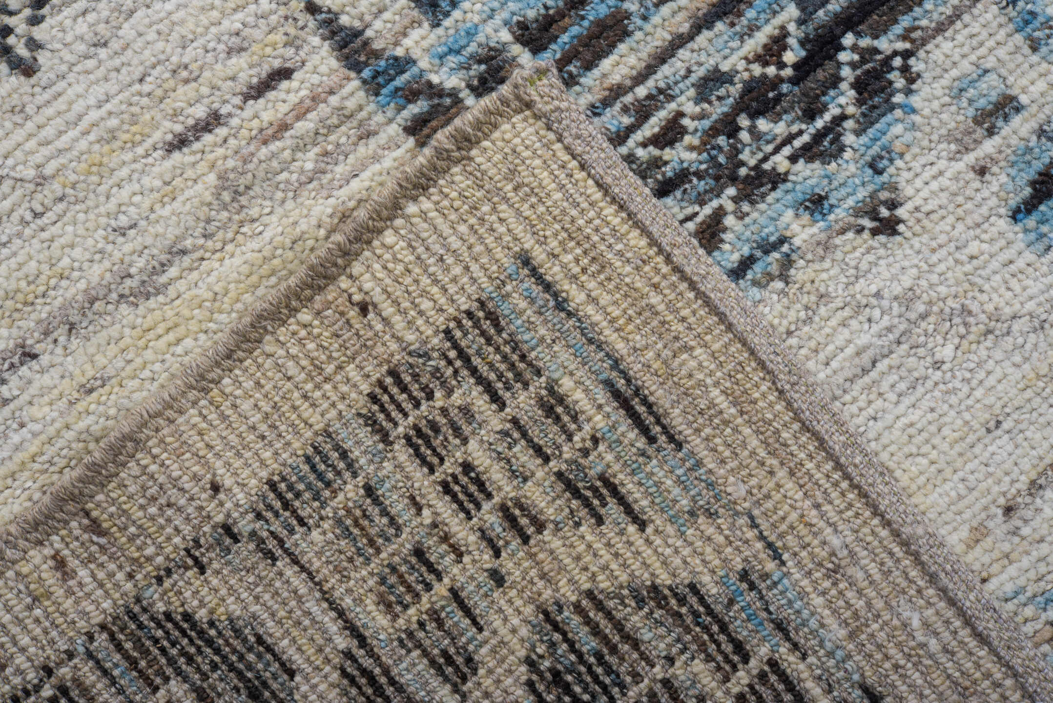 9' x 13' one-of-a-kind handmade vintage Tulu large size rug. Color palette: ivory, charcoal, pale blue, slate, cream, gray