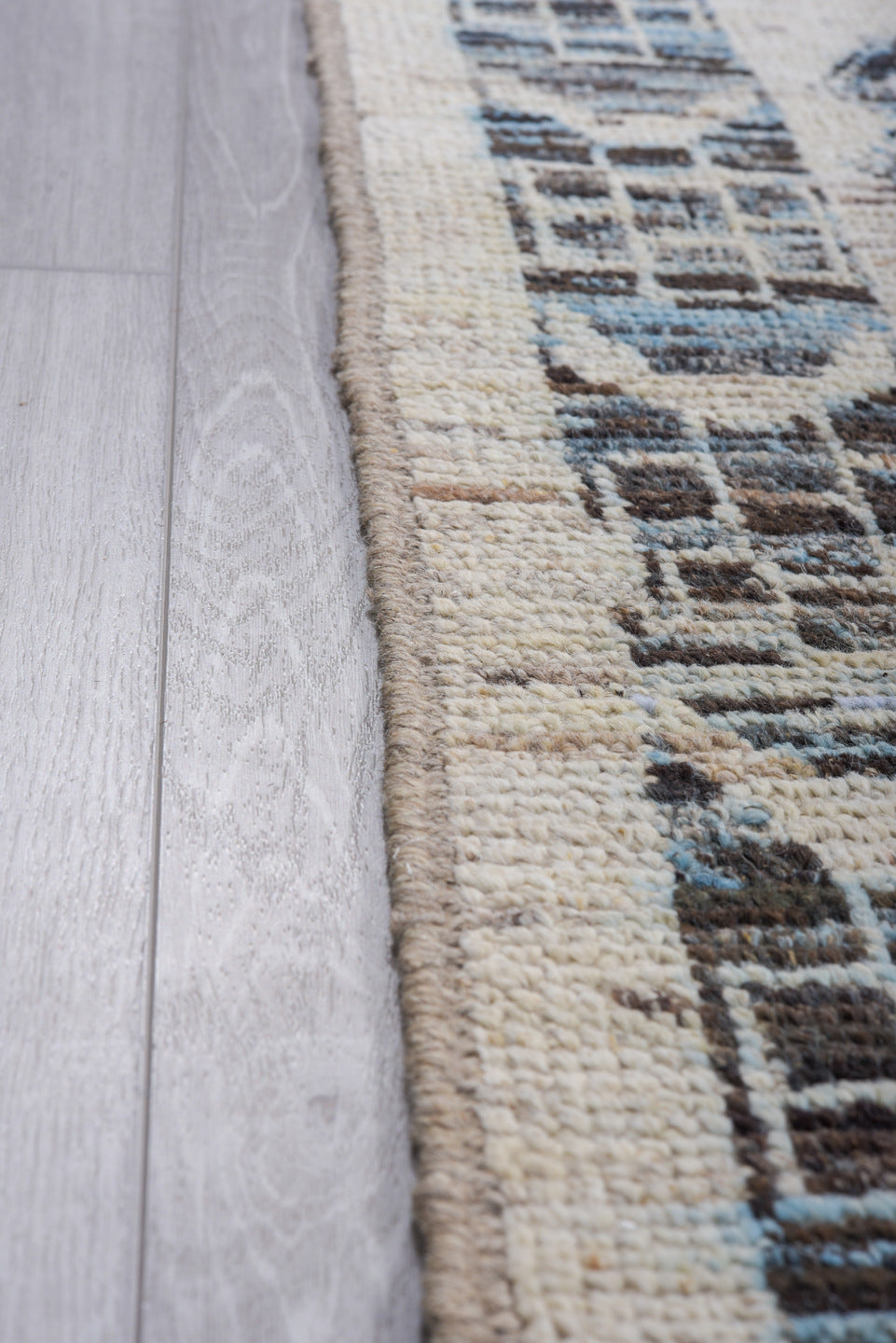 9' x 13' one-of-a-kind handmade vintage Tulu large size rug. Color palette: ivory, charcoal, pale blue, slate, cream, gray