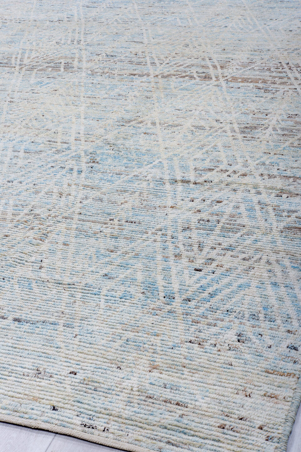 9' x 13' one-of-a-kind handmade vintage Tulu large size rug. Color palette: ivory, pale blue, taupe, light gray, light blue
