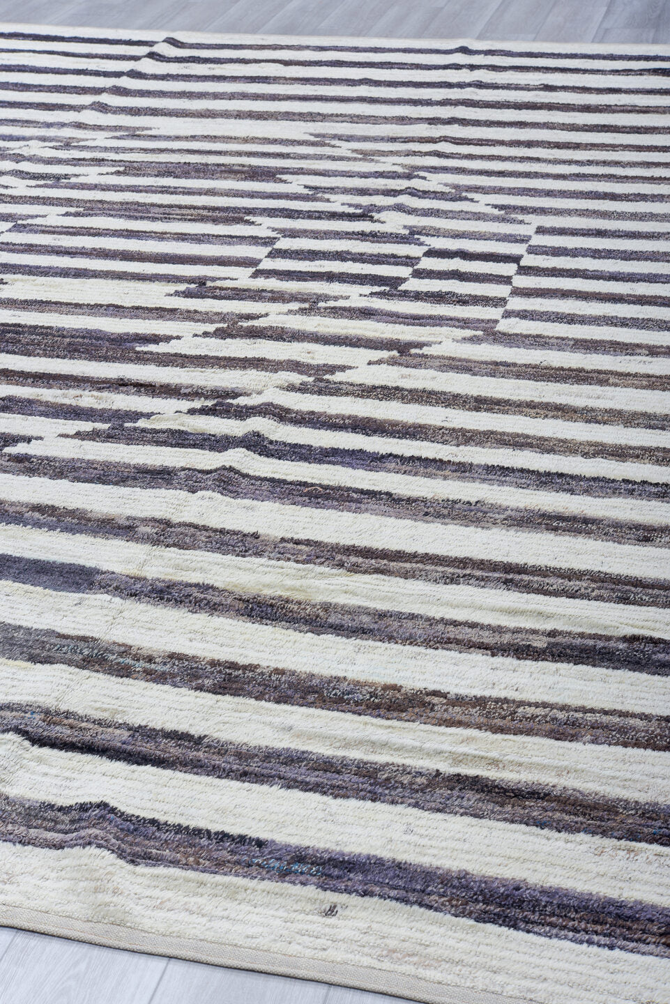 10' x 13' one-of-a-kind handmade vintage Tulu large size rug. Color palette: ivory, charcoal, gray, taupe, black, beige