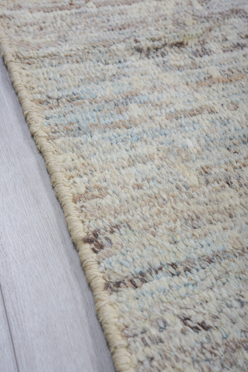 8' x 9' one-of-a-kind handmade vintage Tulu rug. Color palette: ivory, pale blue, taupe, light gray, light blue, beige, gray