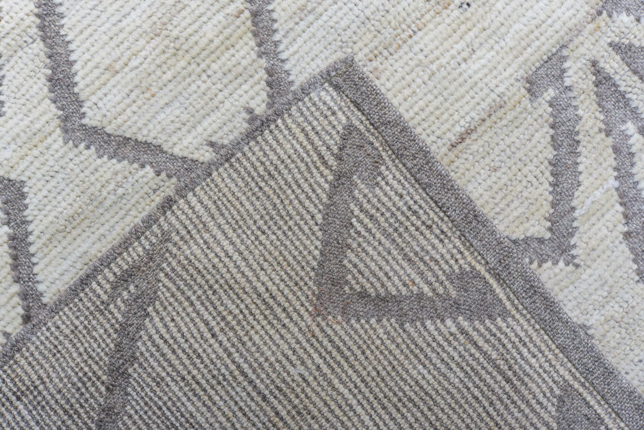 13' x 19' one-of-a-kind handmade vintage Tulu oversize rug. Color palette: ivory, charcoal, taupe, cream, gray, black, beige