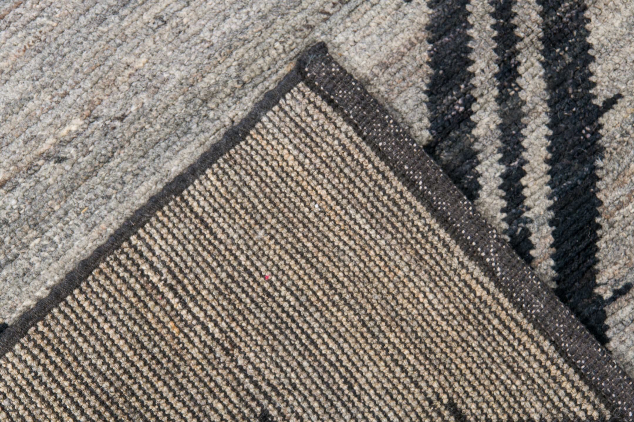 9' x 12' one-of-a-kind handmade vintage Tulu large size rug. Color palette: gray, charcoal, ivory, black