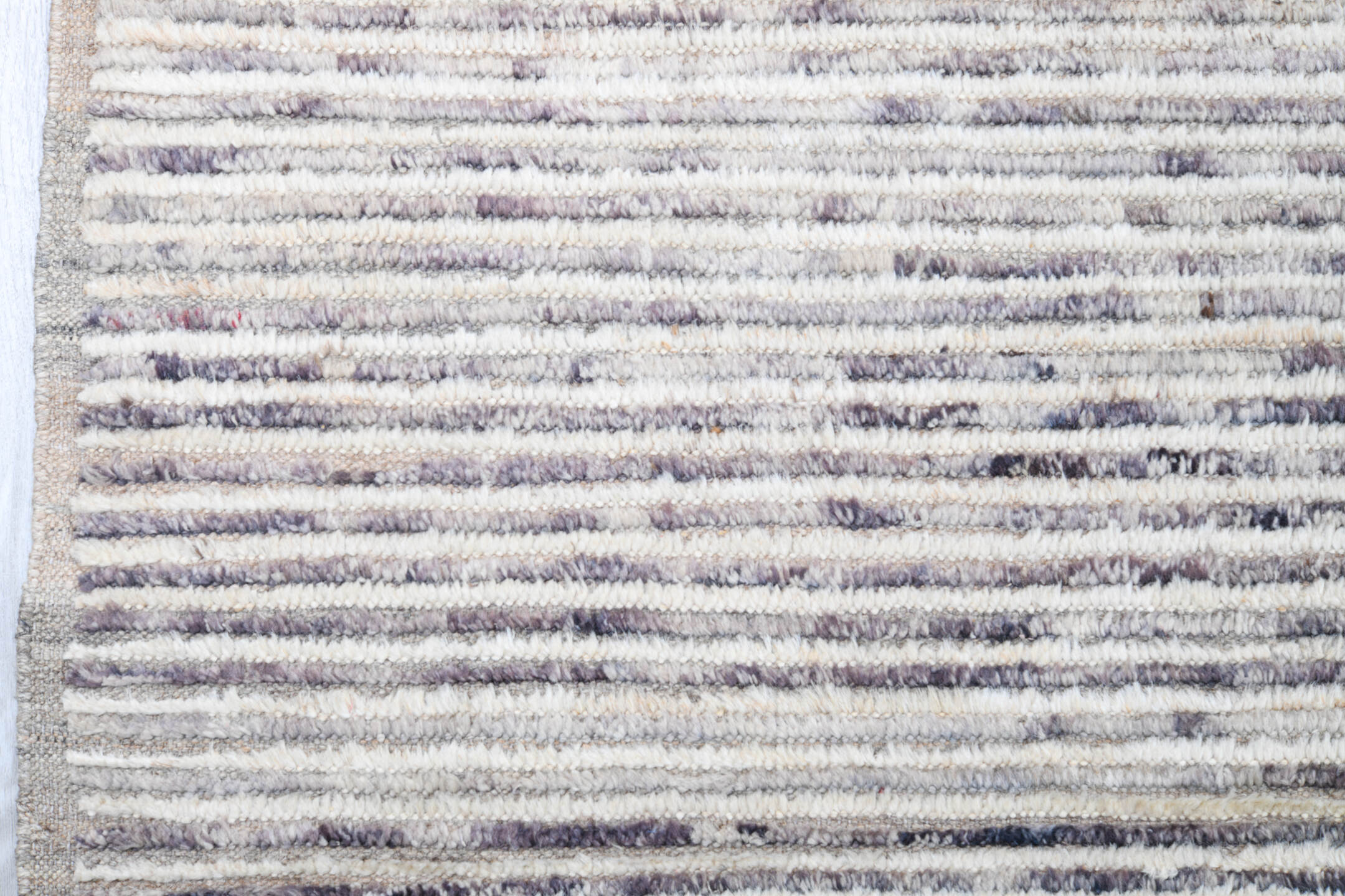 12' x 15' one-of-a-kind handmade vintage Tulu oversize rug. Color palette: ivory, charcoal, slate, rust, taupe, gray, black