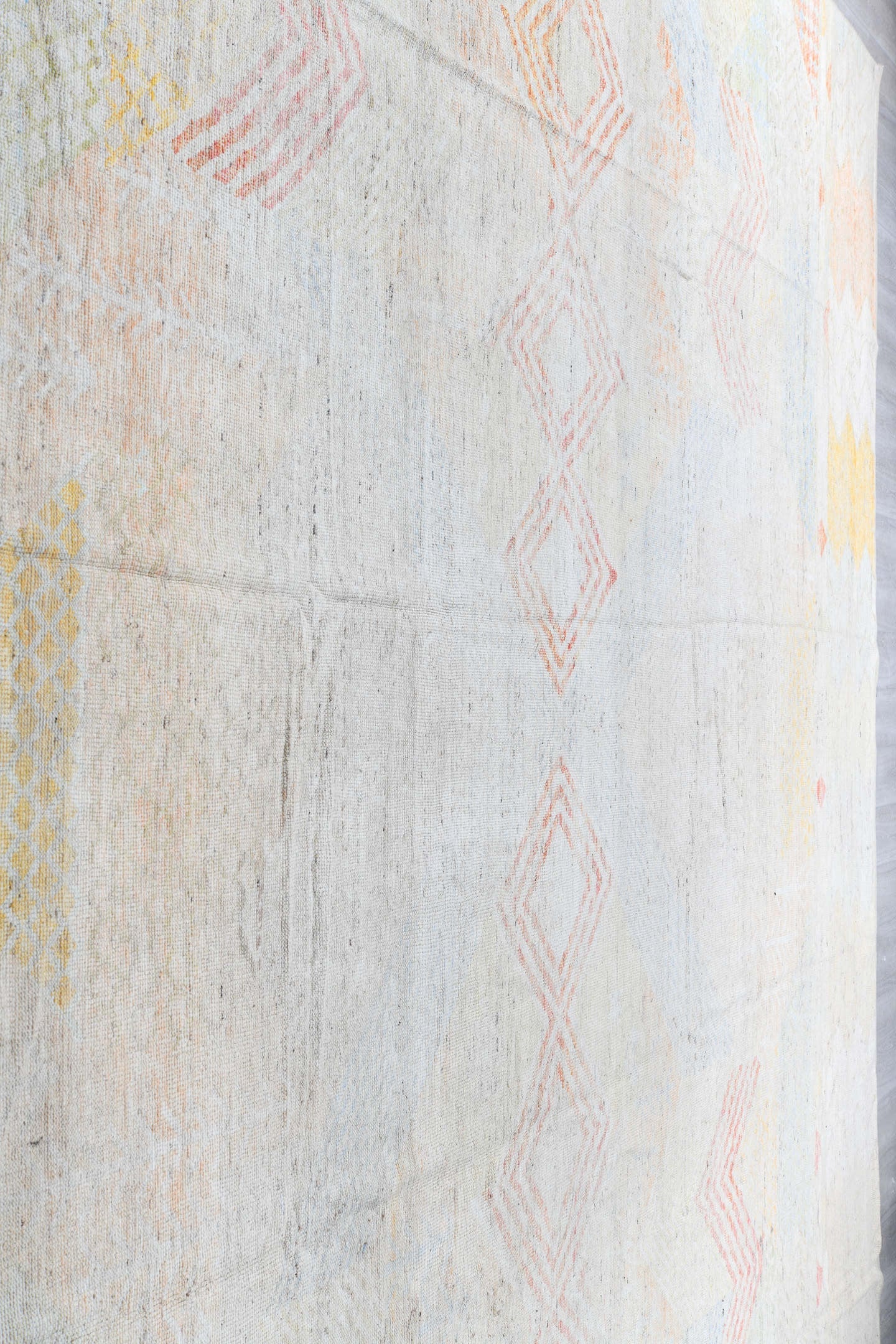 14' x 19' one-of-a-kind handmade vintage Tulu oversize rug. Color palette: ivory, blush, pale blue, soft gold, cream, sand