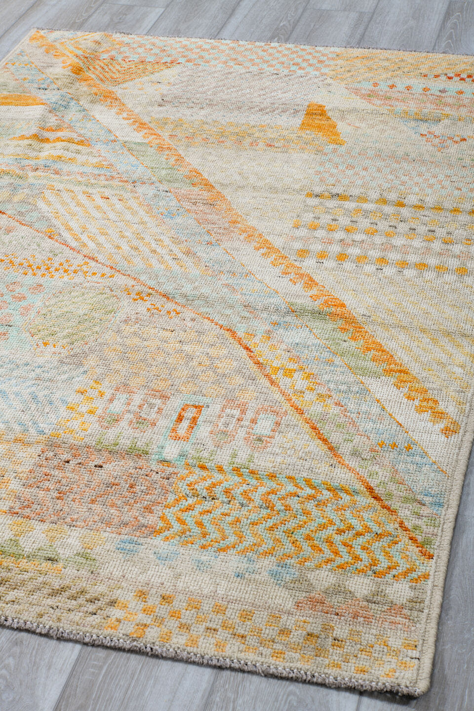 4' x 6' one-of-a-kind handmade vintage Tulu small size rug. Color palette: ivory, pale aqua, apricot, sand, taupe