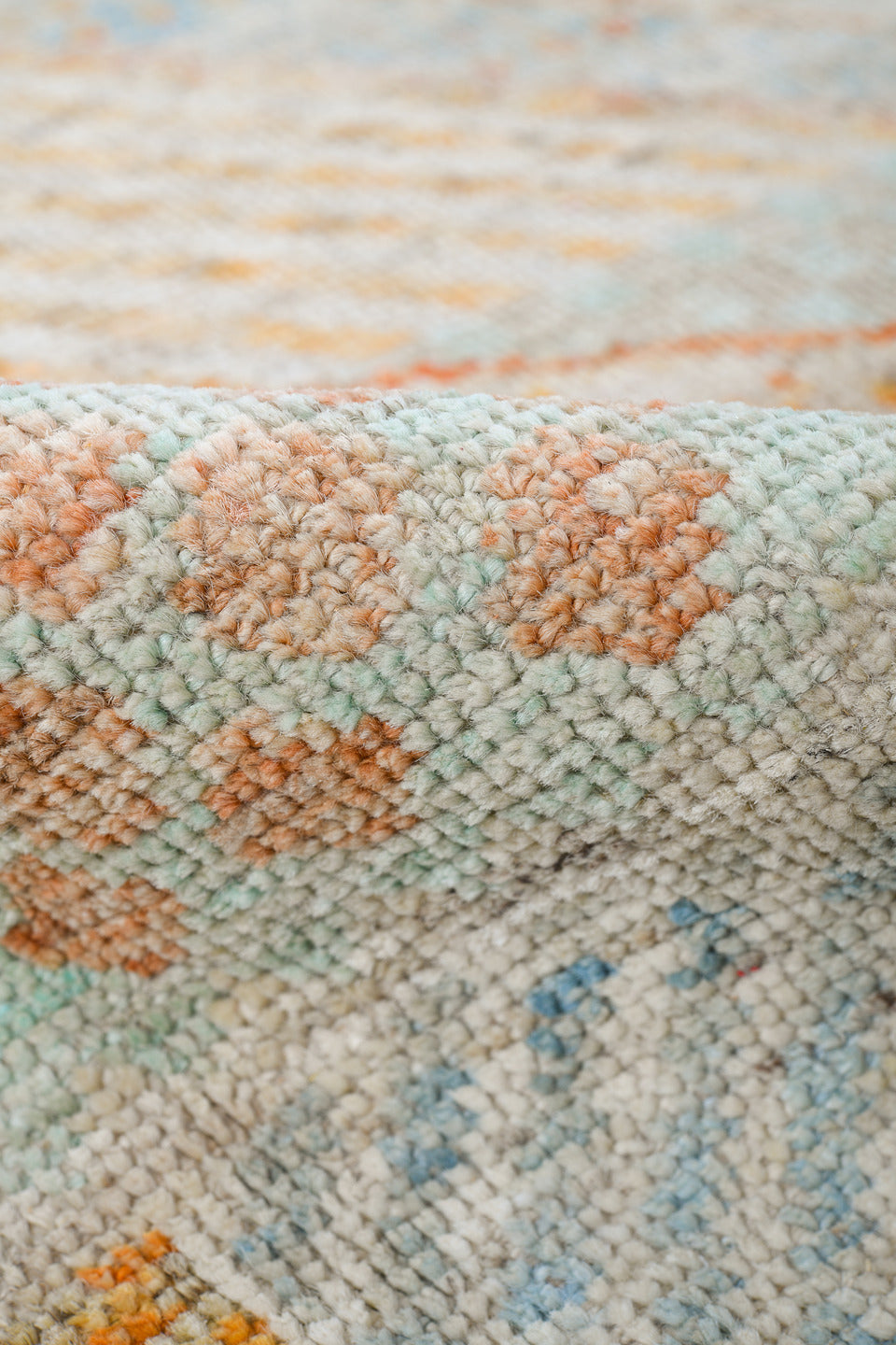 4' x 6' one-of-a-kind handmade vintage Tulu small size rug. Color palette: ivory, pale aqua, apricot, sand, taupe