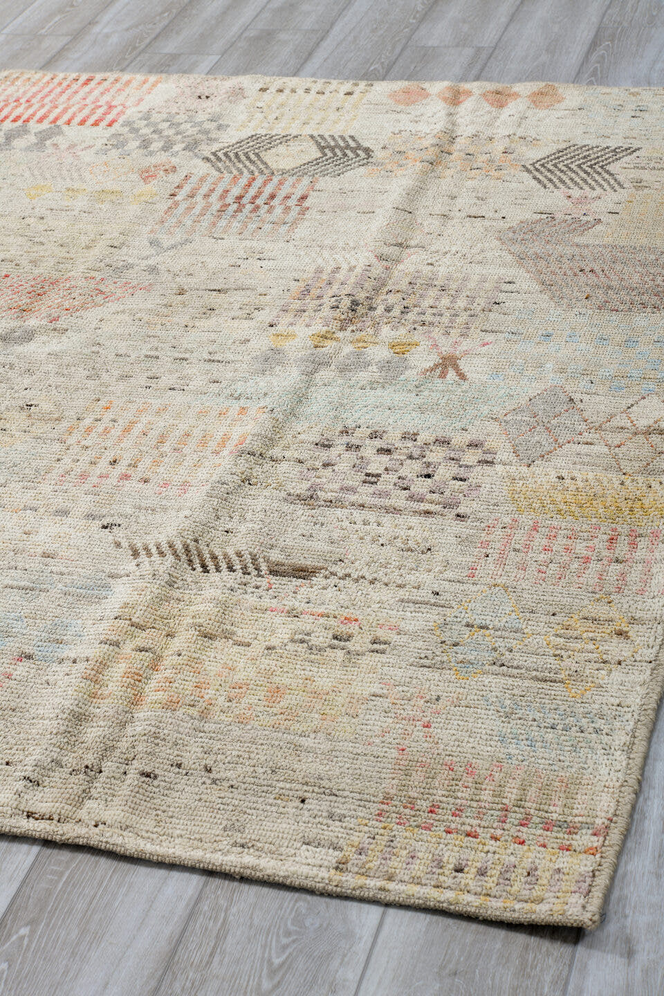 5' x 6' one-of-a-kind handmade vintage Tulu rug. Color palette: ivory, taupe, charcoal, blush, pale blue, camel, rose, gray