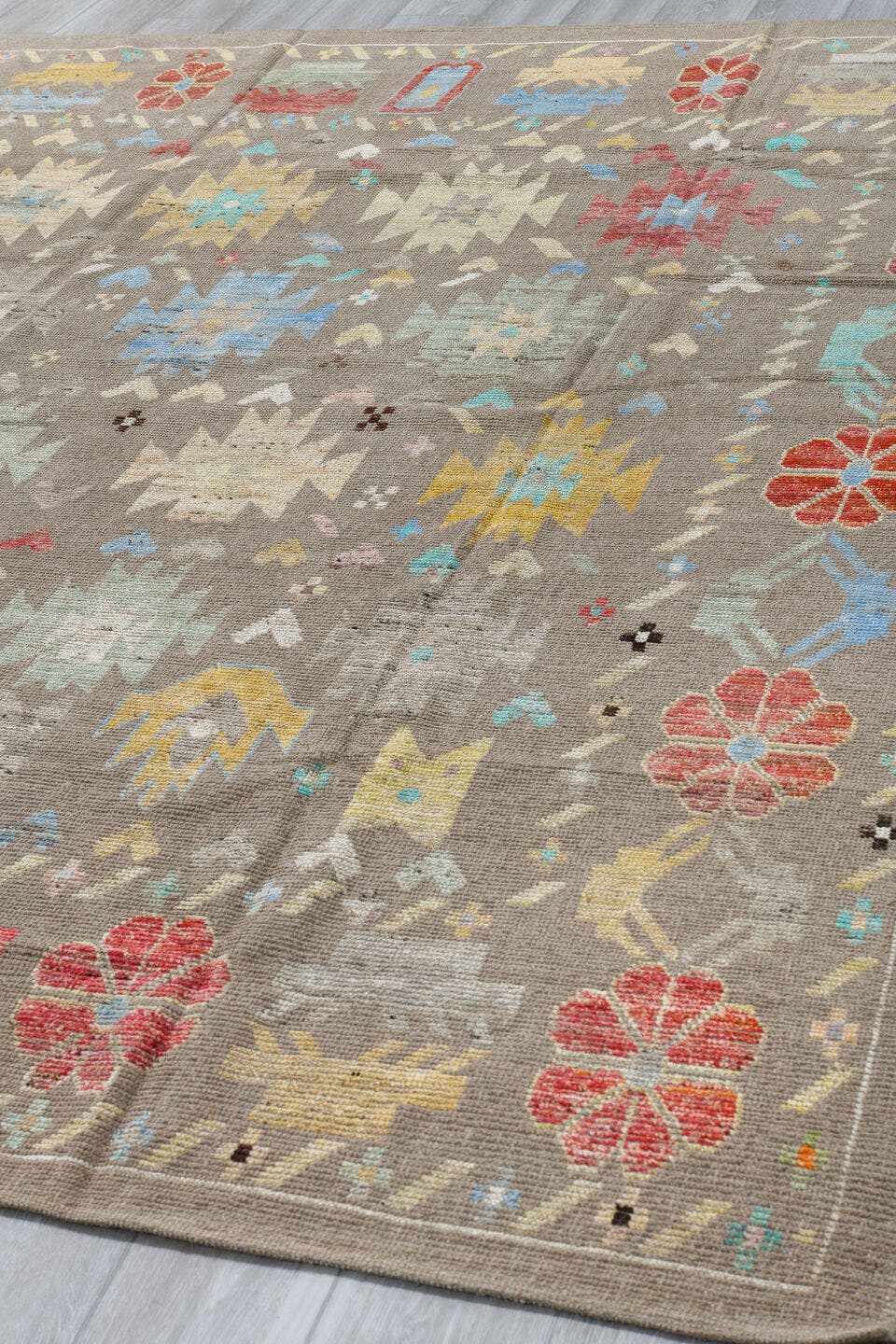 8' x 10' one-of-a-kind handmade vintage Tulu large size rug. Color palette: taupe, ivory, coral, pale blue, cream, soft gold