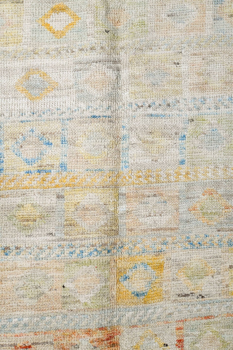 6' x 9' one-of-a-kind handmade vintage Tulu medium size rug. Color palette: ivory, pale blue, peach, sand, sage, cream