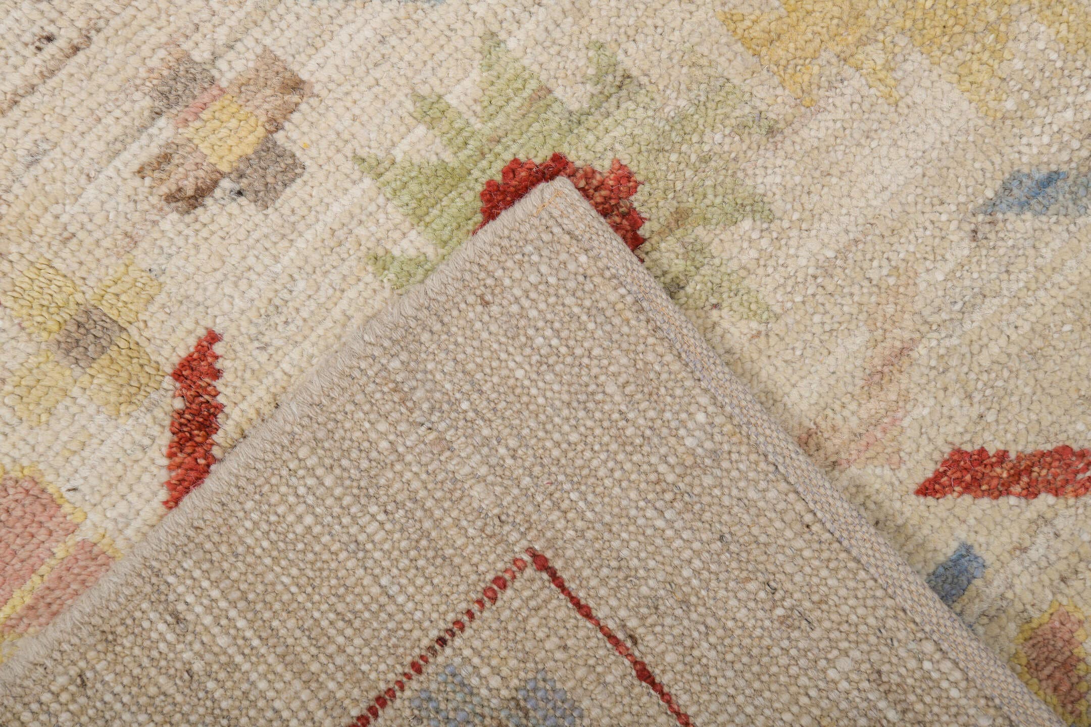 6' x 9' one-of-a-kind handmade vintage Tulu medium size rug. Color palette: ivory, rust, pale blue, blush, soft yellow, sage