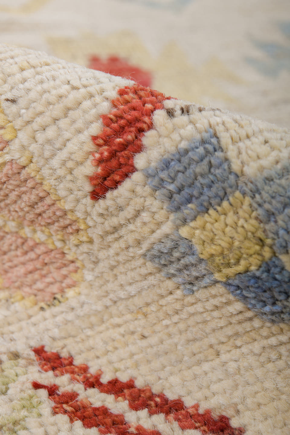 6' x 9' one-of-a-kind handmade vintage Tulu medium size rug. Color palette: ivory, rust, pale blue, blush, soft yellow, sage