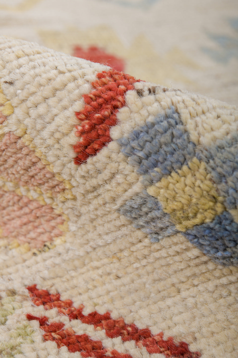 6' x 9' one-of-a-kind handmade vintage Tulu medium size rug. Color palette: ivory, rust, pale blue, blush, soft yellow, sage