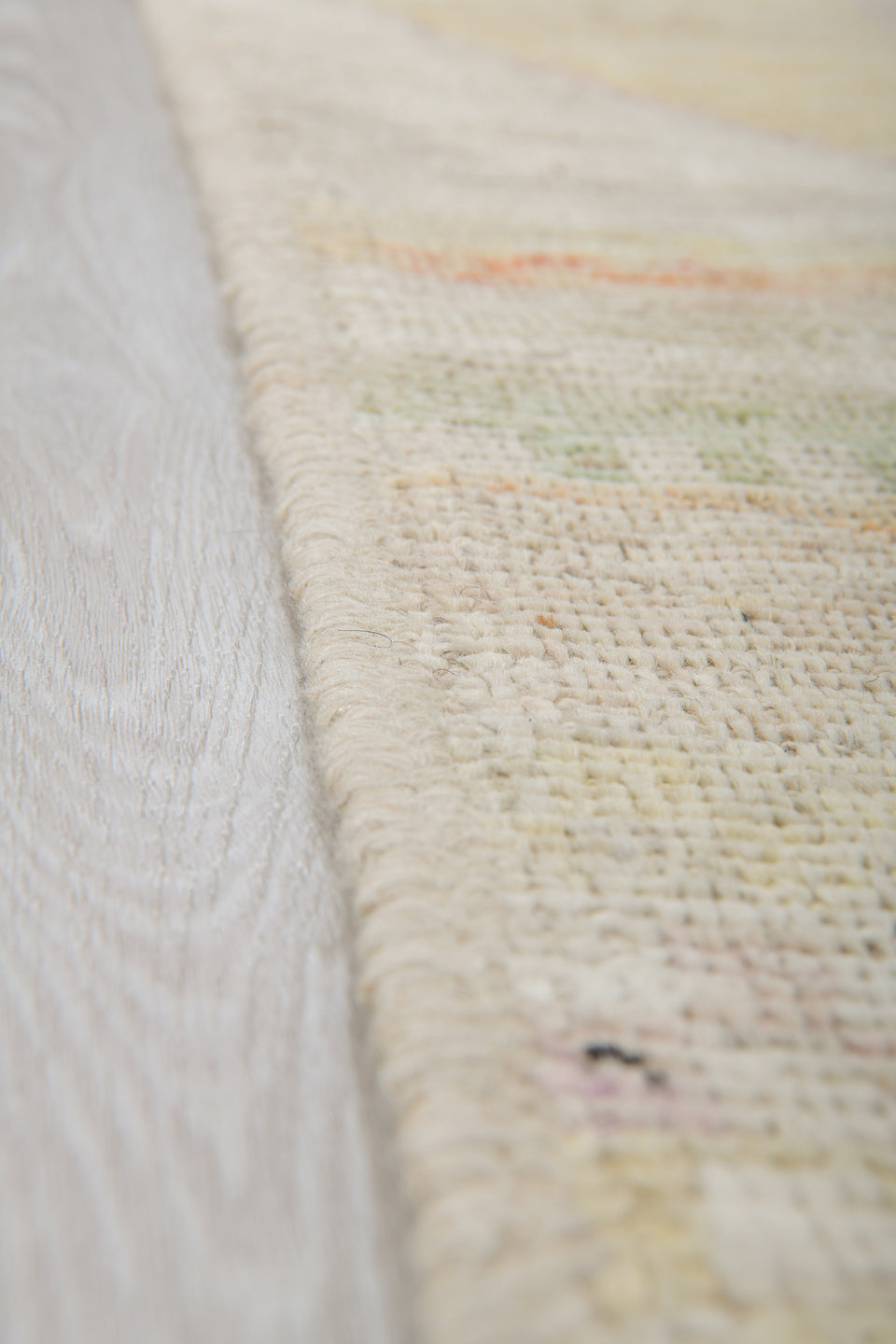 5' x 6' one-of-a-kind handmade vintage Tulu rug. Color palette: ivory, sage, apricot, pale blue, butter, taupe, green