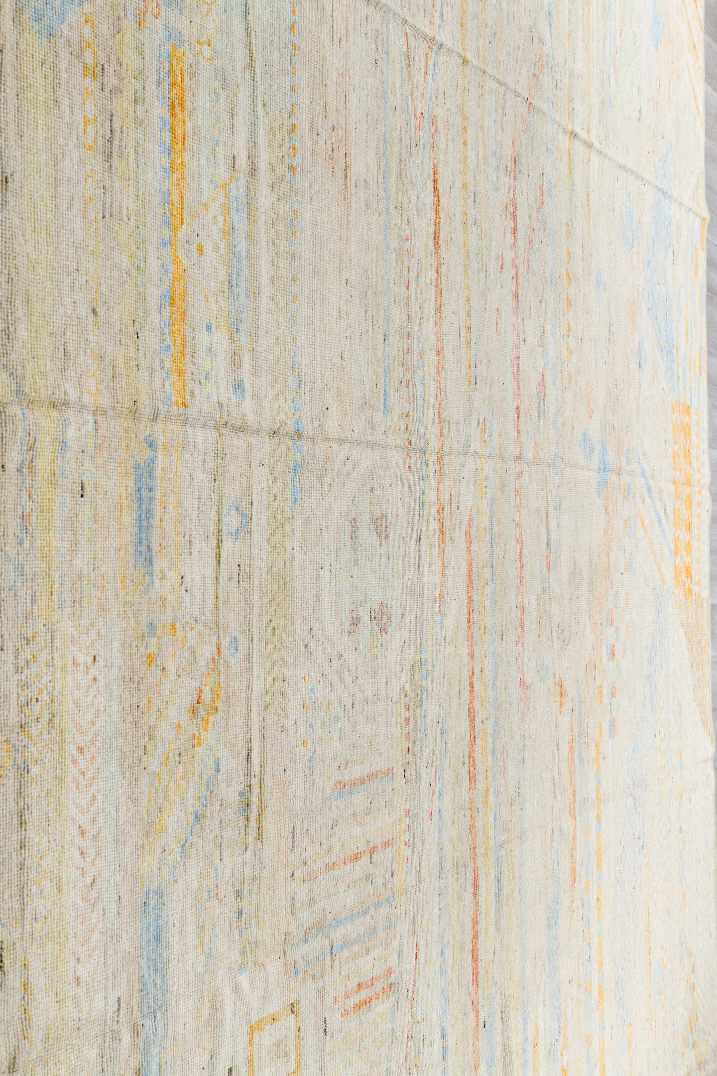 13' x 16' one-of-a-kind handmade vintage Tulu oversize rug. Color palette: ivory, pale blue, cream, saffron, soft coral