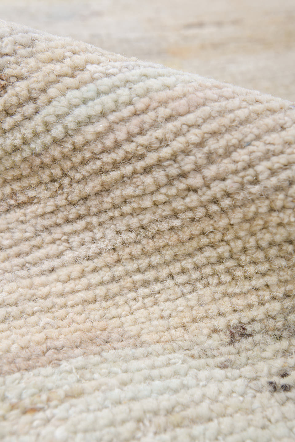 10' x 14' one-of-a-kind handmade vintage Tulu large size rug. Color palette: ivory, blush, pale gold, light blue, beige