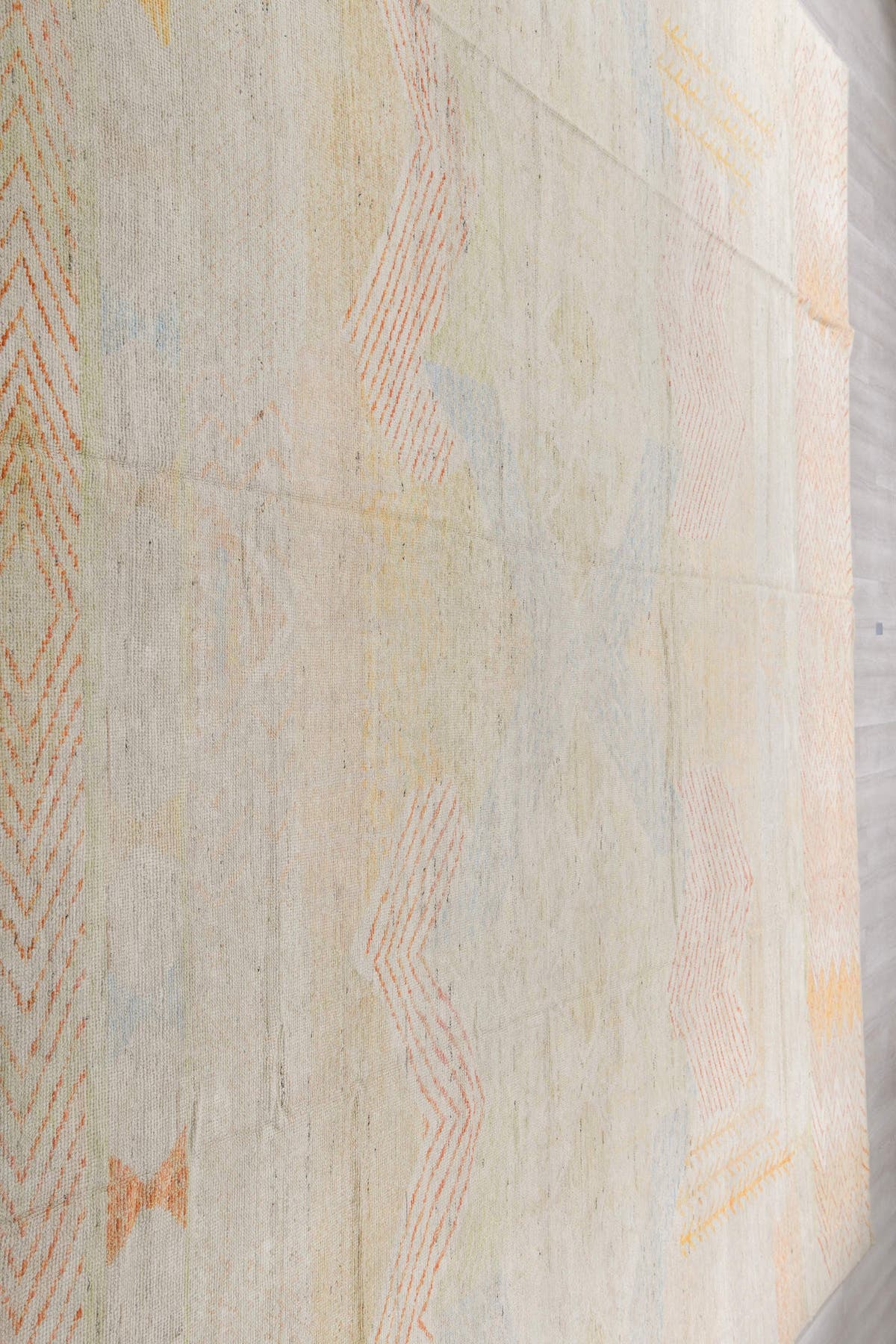 13' x 16' one-of-a-kind handmade vintage Tulu oversize rug. Color palette: ivory, blush, saffron, powder_blue, pale_gold