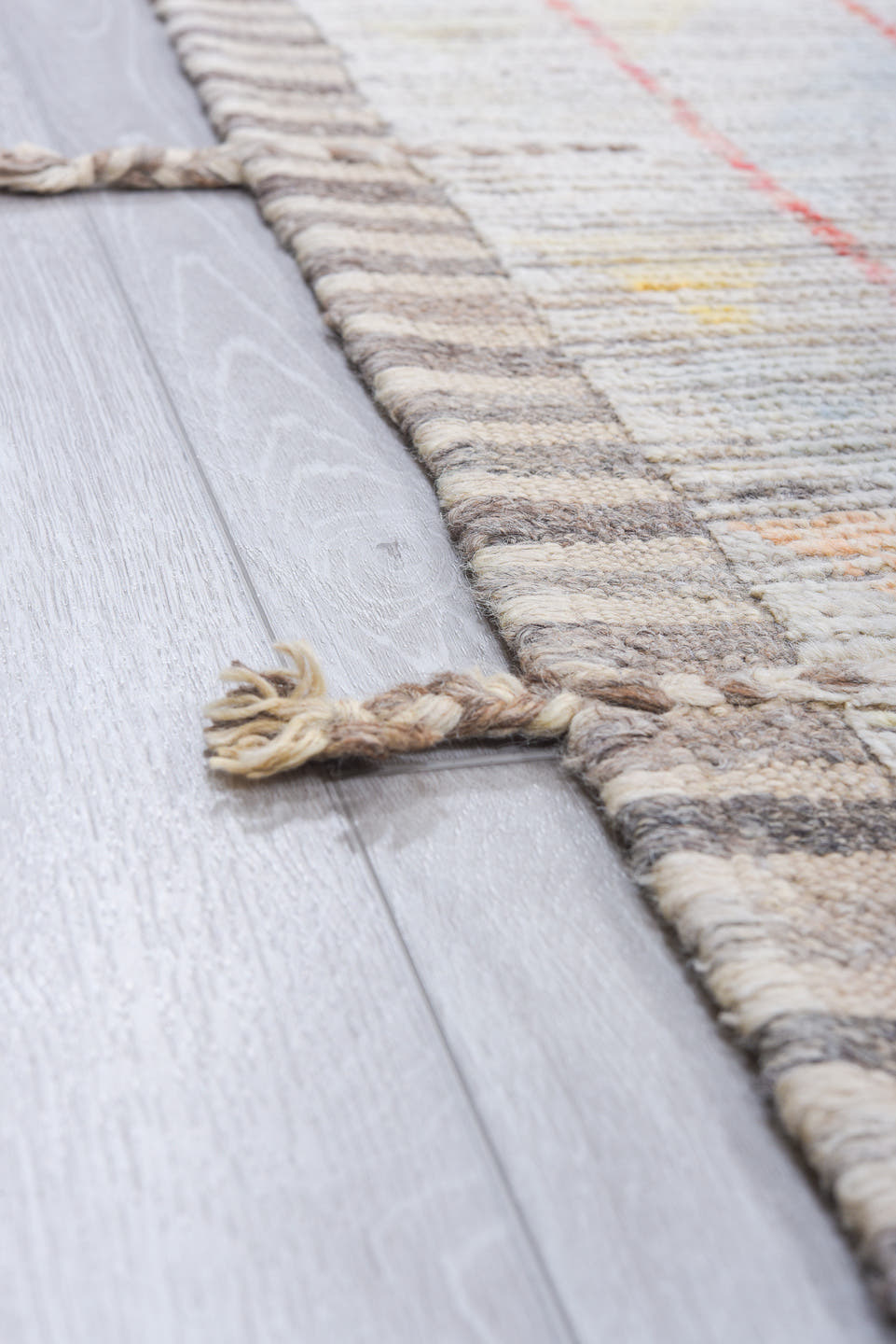 12' x 15' one-of-a-kind handmade vintage Tulu oversize rug. Color palette: ivory, coral, pale blue, butter yellow, sage