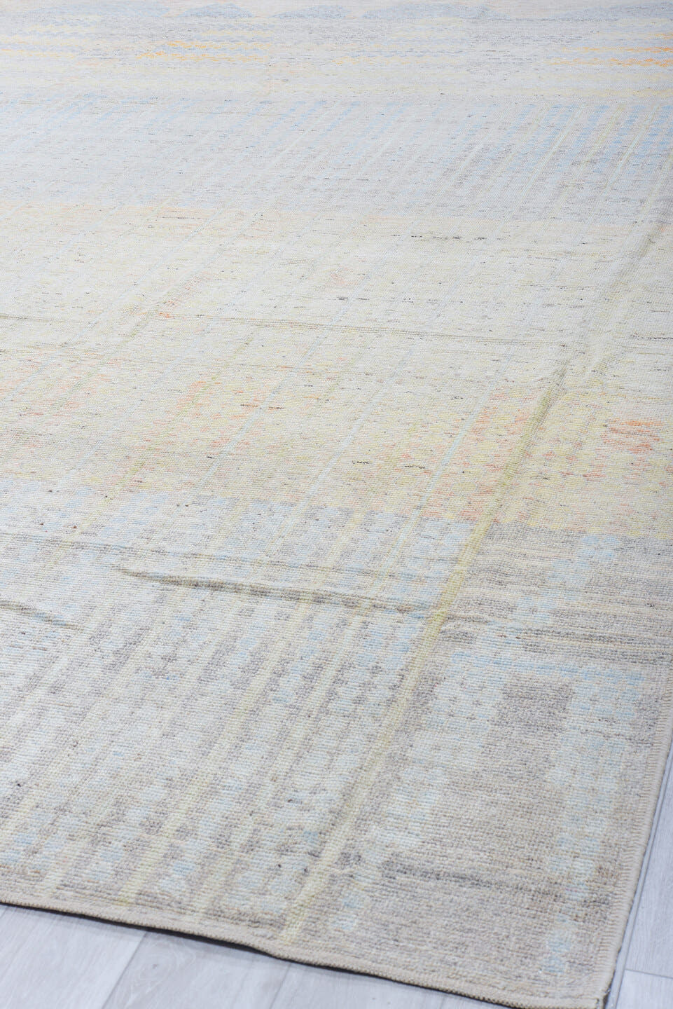 13' x 16' one-of-a-kind handmade vintage Tulu oversize rug. Color palette: ivory, pale blue, cream, peach, taupe, light gray