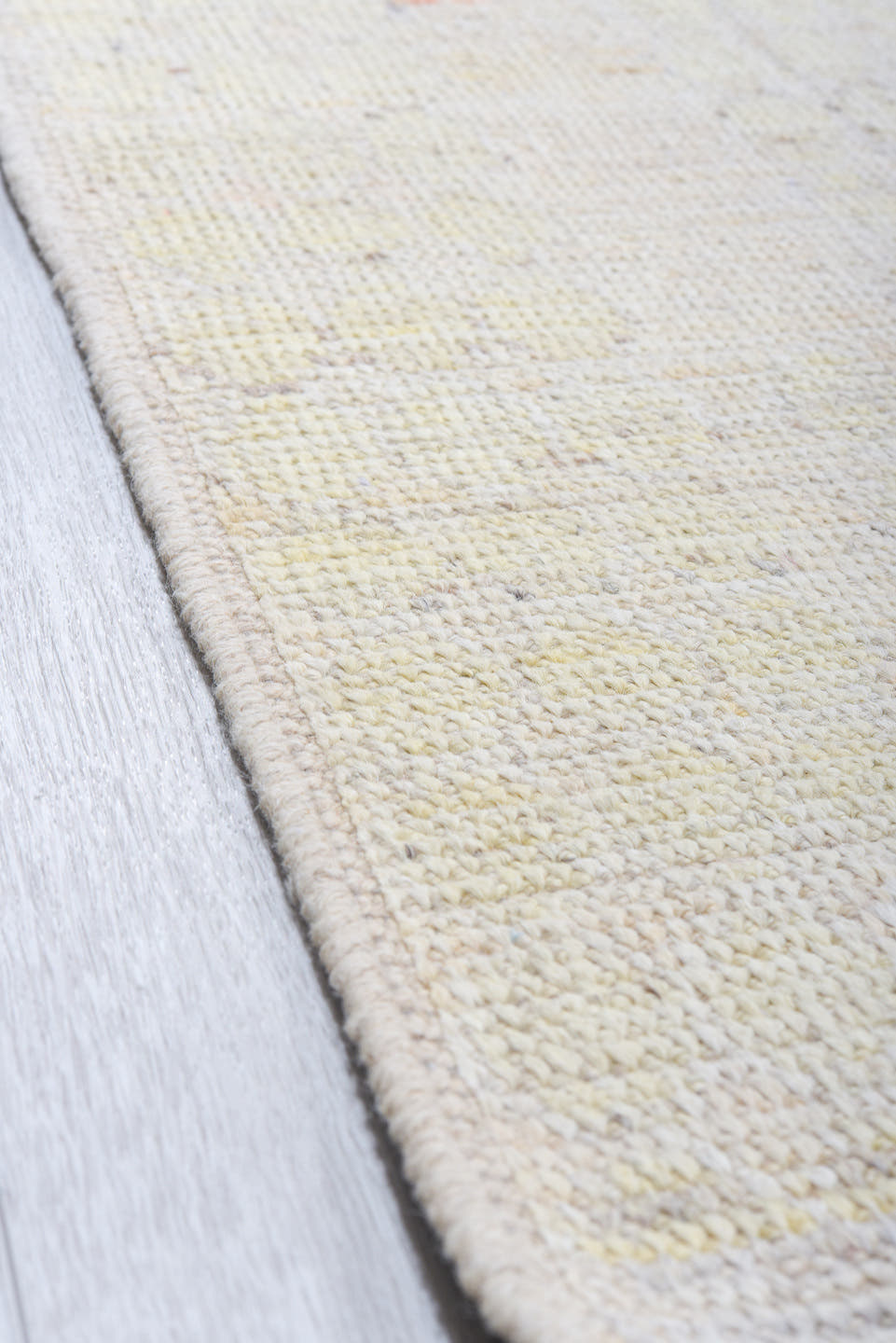 13' x 16' one-of-a-kind handmade vintage Tulu oversize rug. Color palette: ivory, pale blue, cream, peach, taupe, light gray