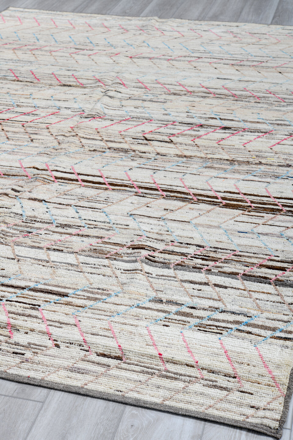 6' x 9' one-of-a-kind handmade vintage Tulu medium size rug. Color palette: ivory, taupe, brown, pink, pale_blue, gray