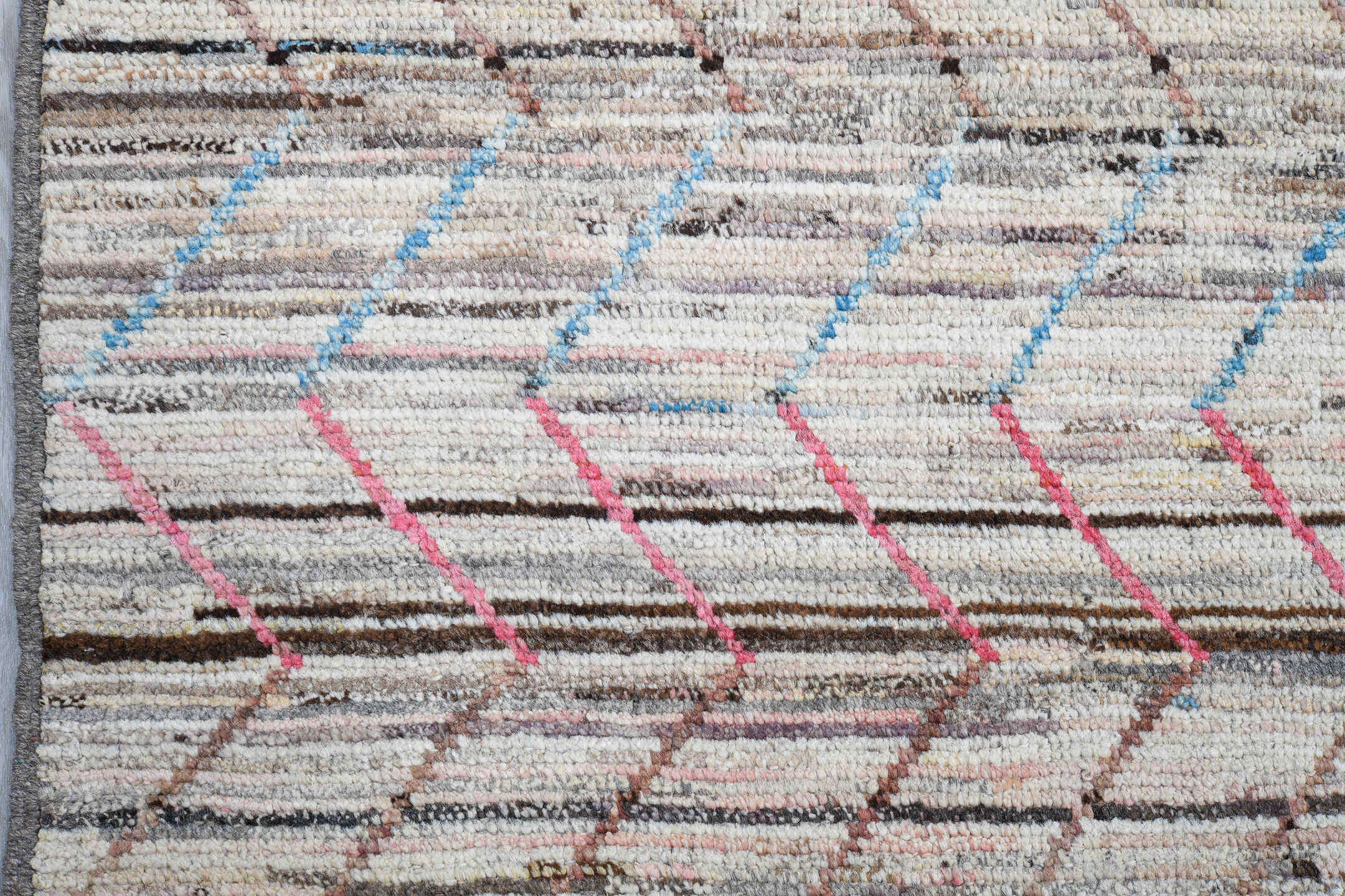 6' x 9' one-of-a-kind handmade vintage Tulu medium size rug. Color palette: ivory, taupe, brown, pink, pale_blue, gray