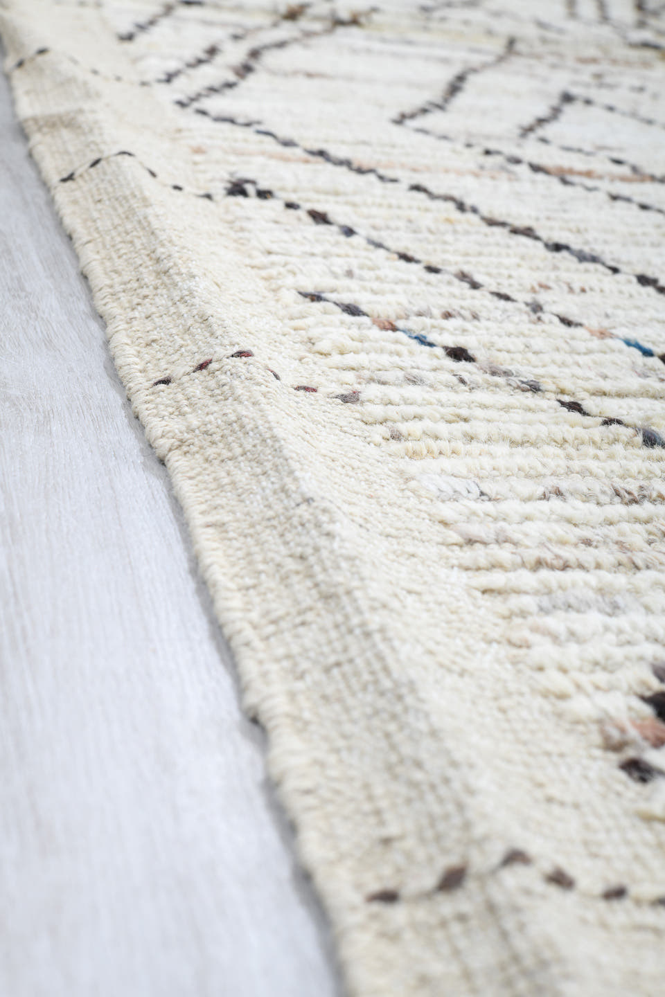 8' x 9' one-of-a-kind handmade vintage Tulu rug. Color palette: ivory, taupe, charcoal, gray, beige, black
