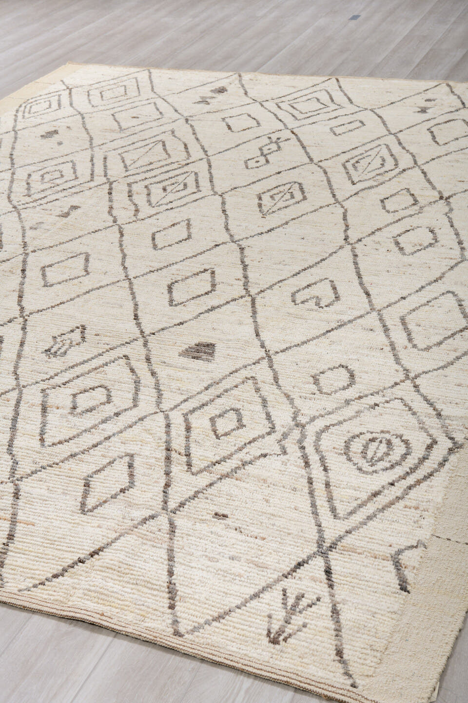9' x 12' one-of-a-kind handmade vintage Tulu large size rug. Color palette: ivory, charcoal, cream, taupe, slate, black