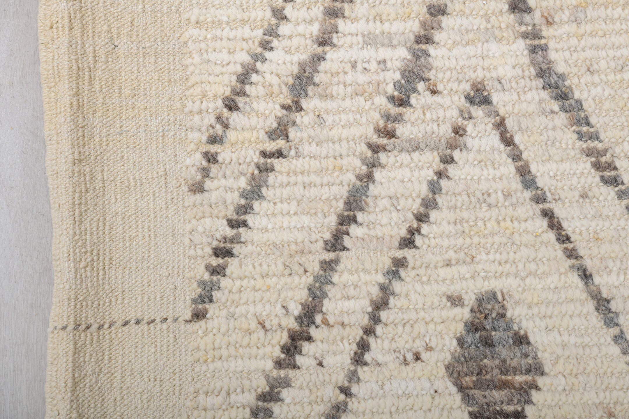 9' x 12' one-of-a-kind handmade vintage Tulu large size rug. Color palette: ivory, charcoal, cream, taupe, slate, black
