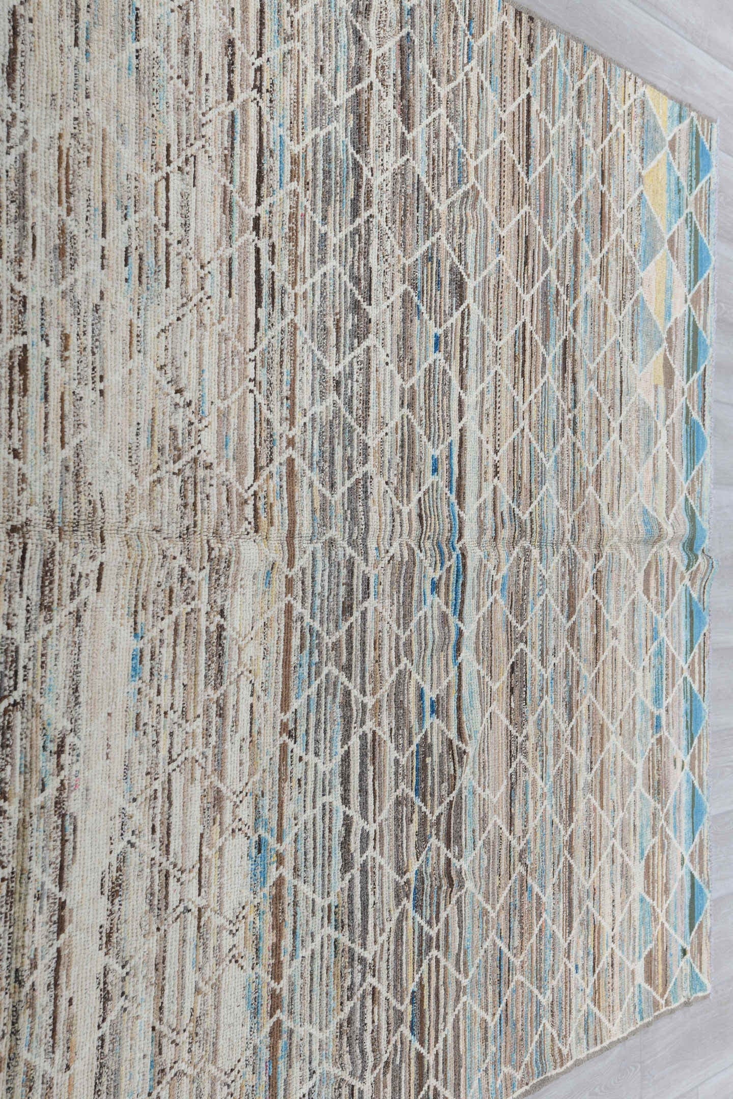 6' x 9' one-of-a-kind handmade vintage Tulu medium size rug. Color palette: ivory, taupe, brown, sky_blue, camel, slate